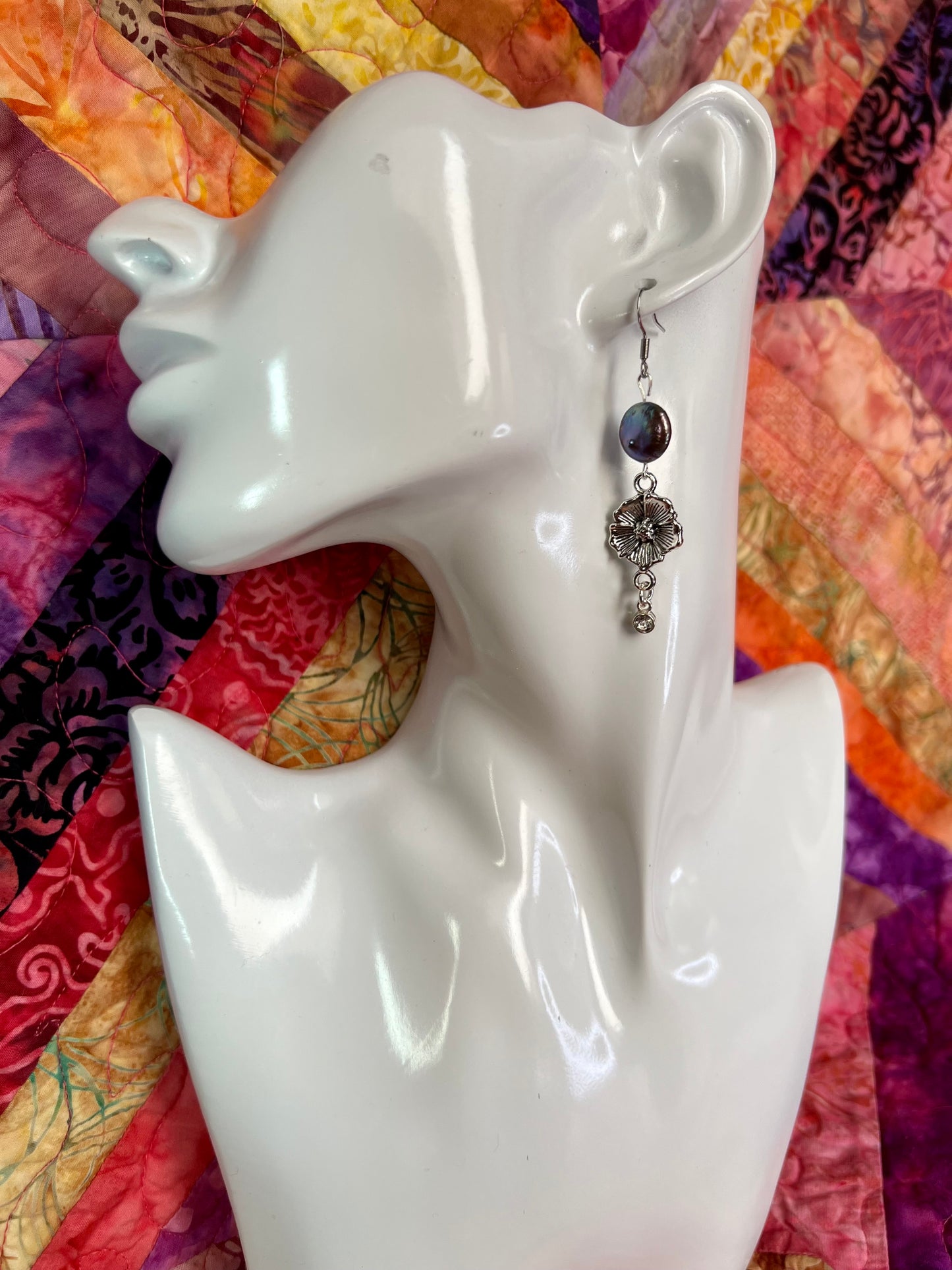 Earrings- Stainless steel ear hooks, silver plated metal with freshwater coin pearls. Asymmetrical.