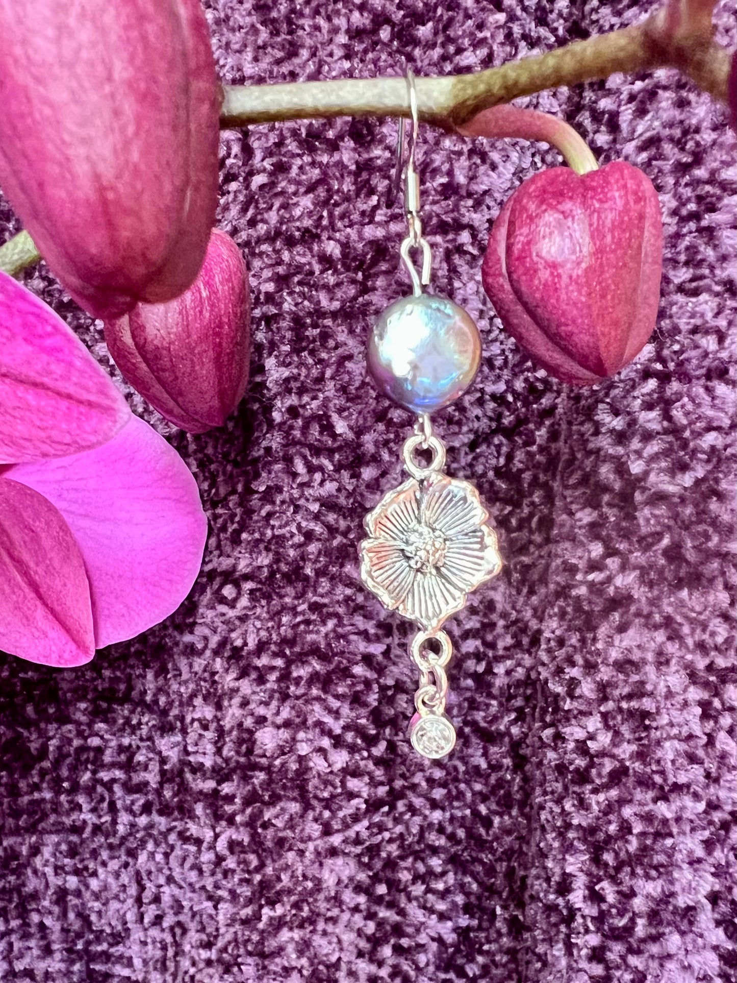 Earrings- Stainless steel ear hooks, silver plated metal with freshwater coin pearls. Asymmetrical.