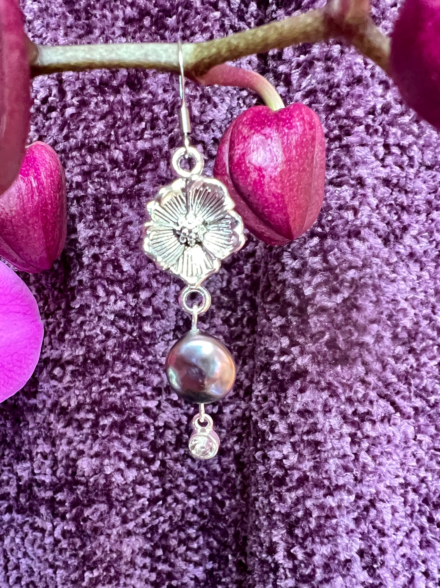 Earrings- Stainless steel ear hooks, silver plated metal with freshwater coin pearls. Asymmetrical.