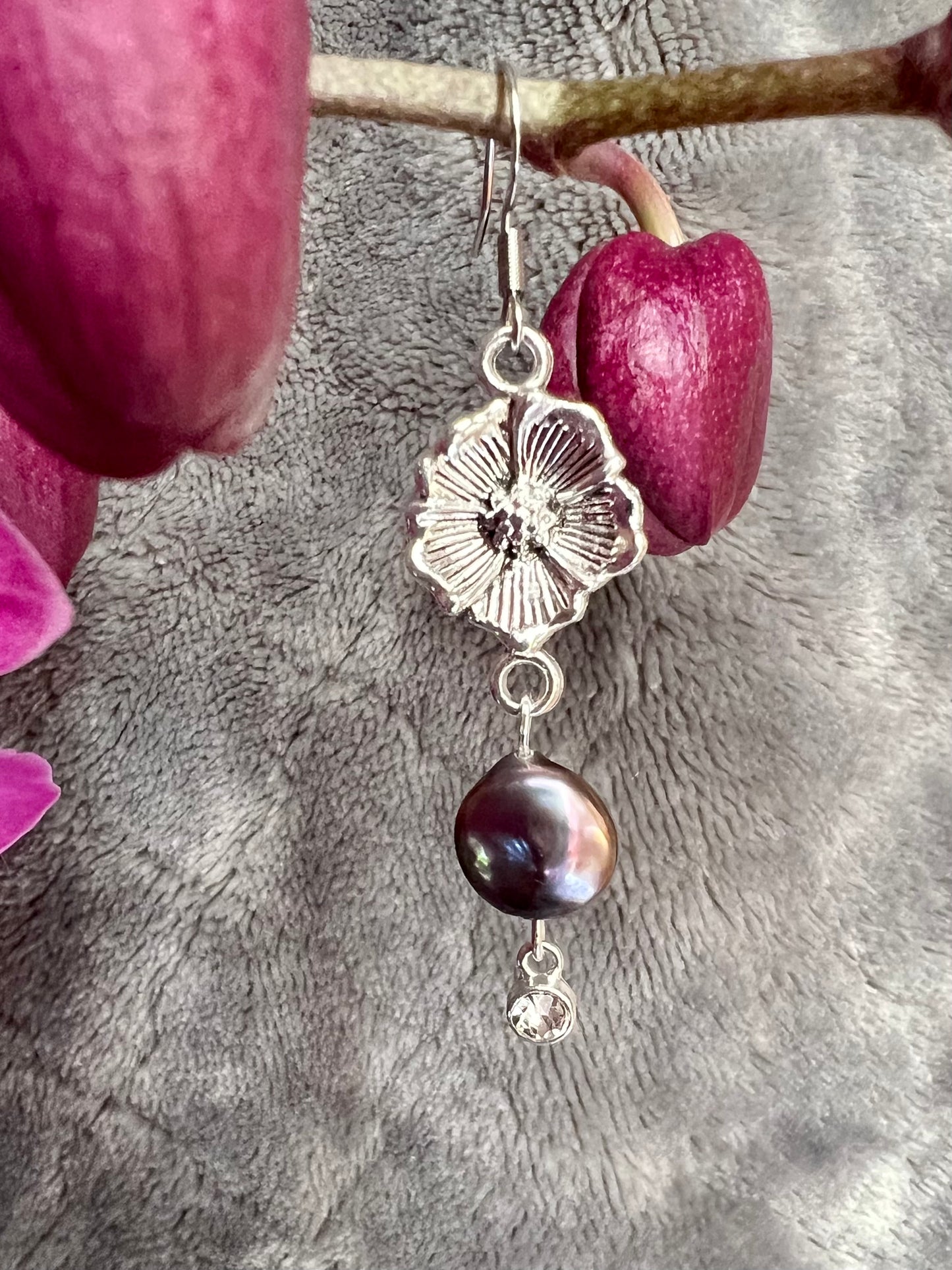 Earrings- Stainless steel ear hooks, silver plated metal with freshwater coin pearls. Asymmetrical.