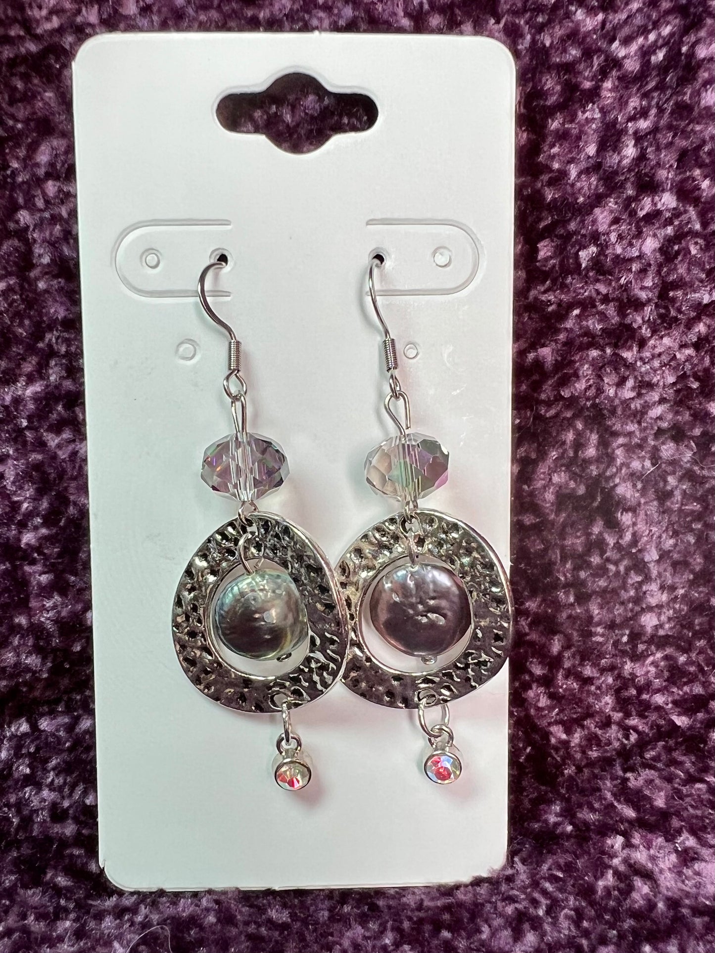 Earrings- Stainless steel ear hooks, silver plated metal and crystals, freshwater coin pearls, and crystal drop charm beads.