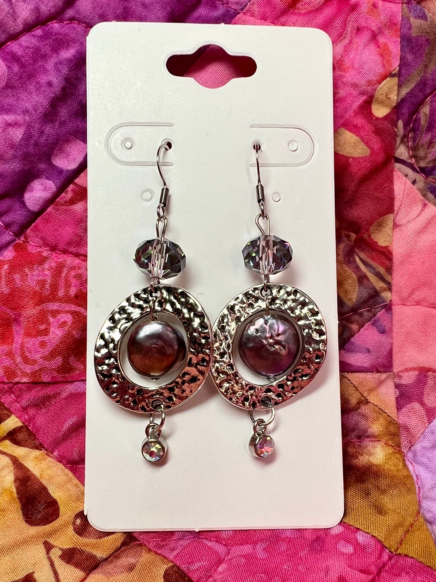 Earrings- Stainless steel ear hooks, silver plated metal and crystals, freshwater coin pearls, and crystal drop charm beads.