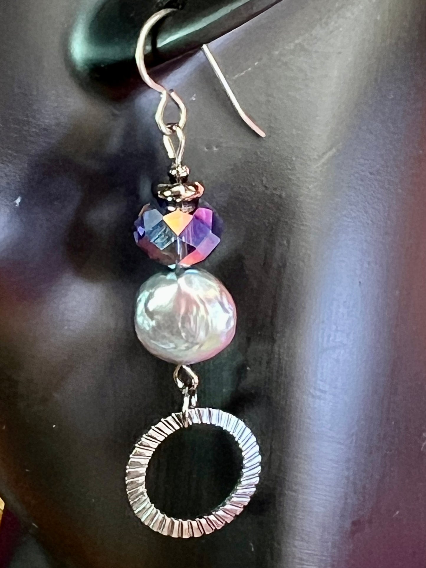 Earrings- Titanium ear hooks, gunmetal plated metal, crystals, and freshwater coin pearls.