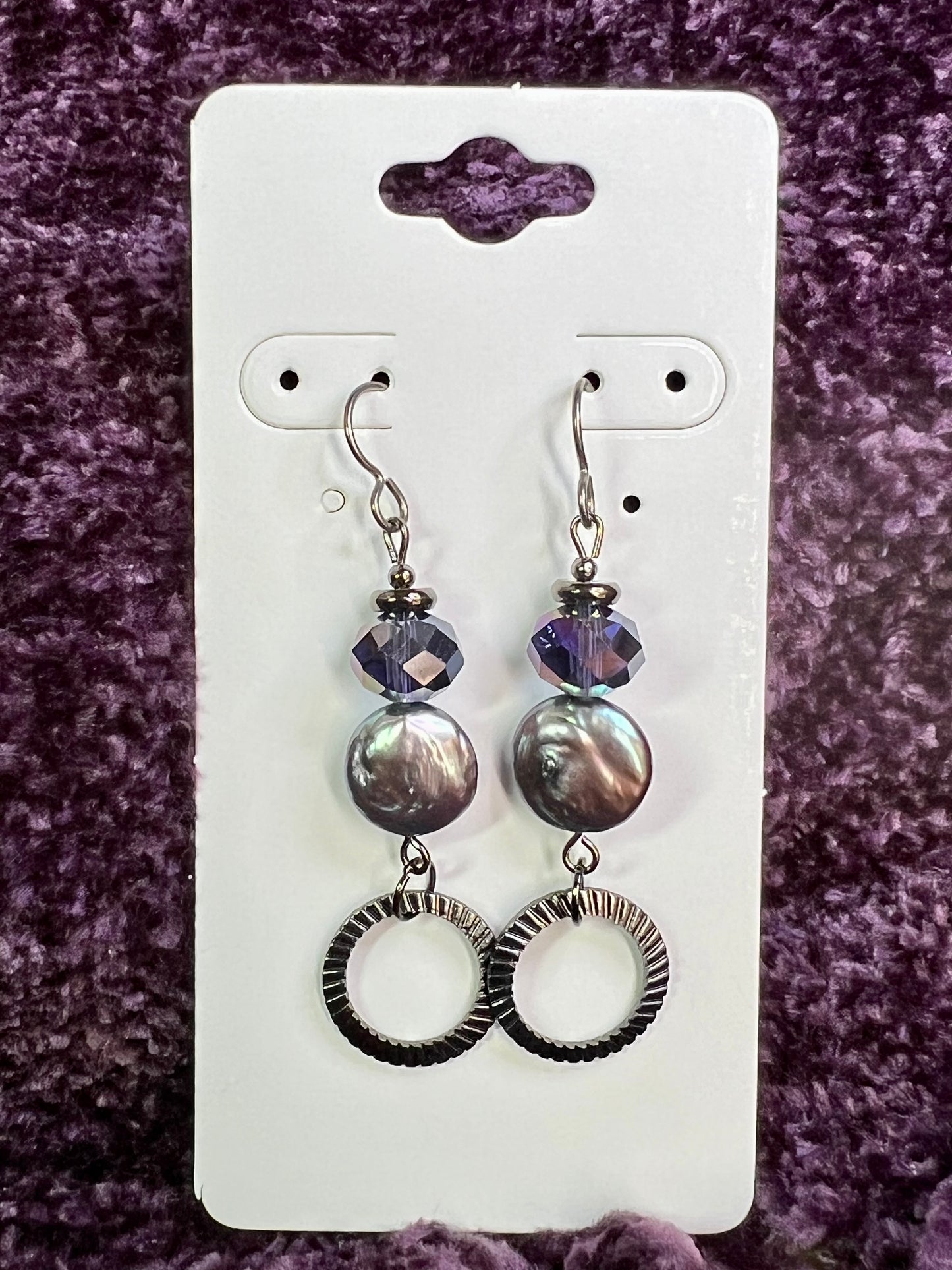 Earrings- Titanium ear hooks, gunmetal plated metal, crystals, and freshwater coin pearls.