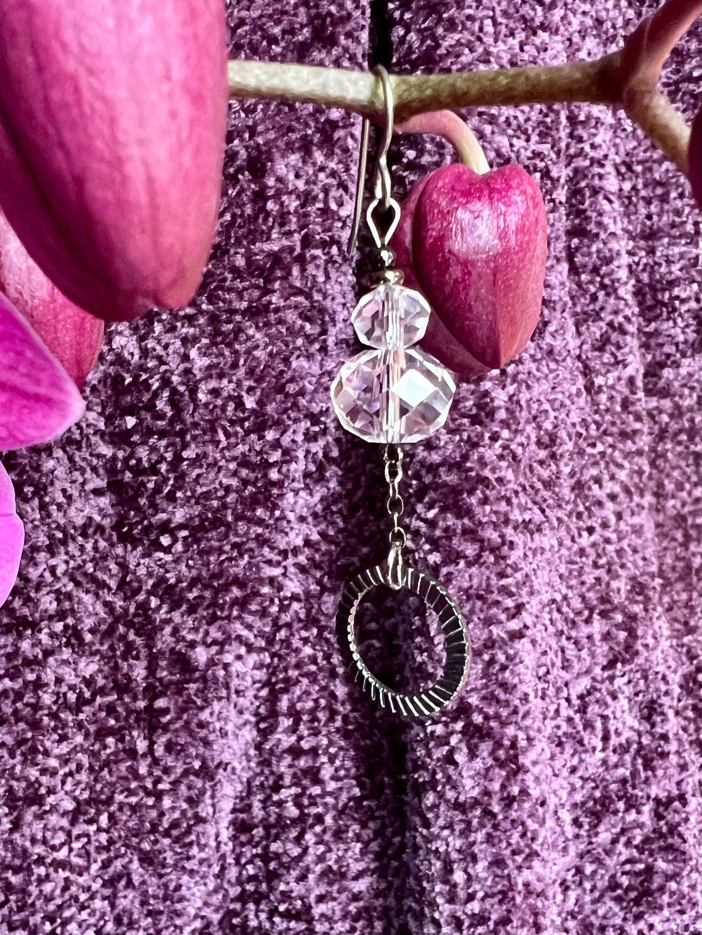 Earrings- Titanium ear hooks, gunmetal plated metal and clear crystals.