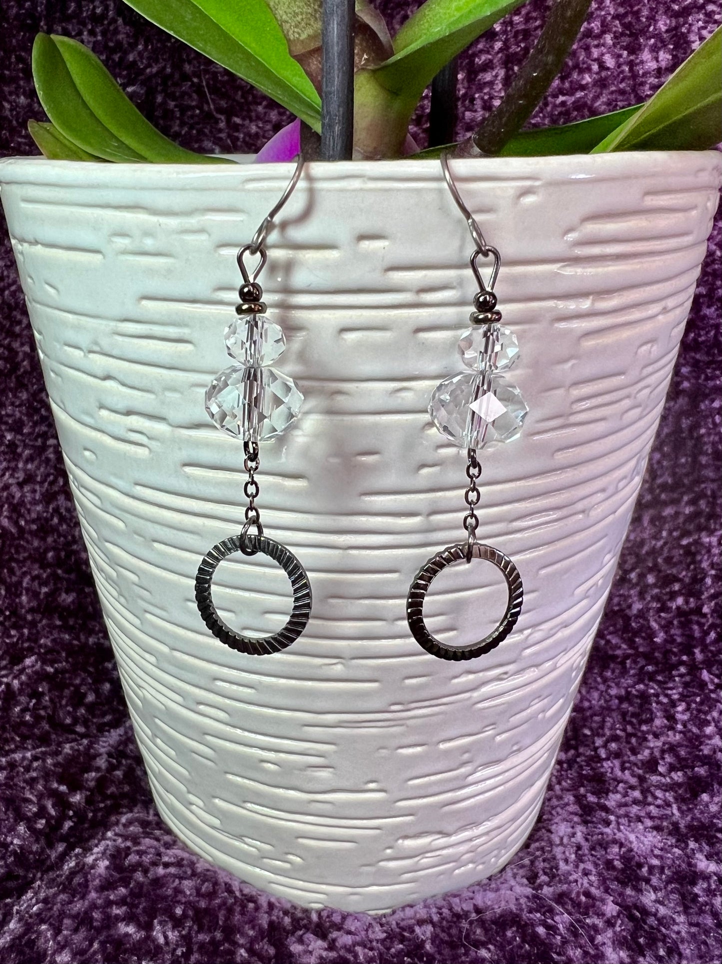 Earrings- Titanium ear hooks, gunmetal plated metal and clear crystals.