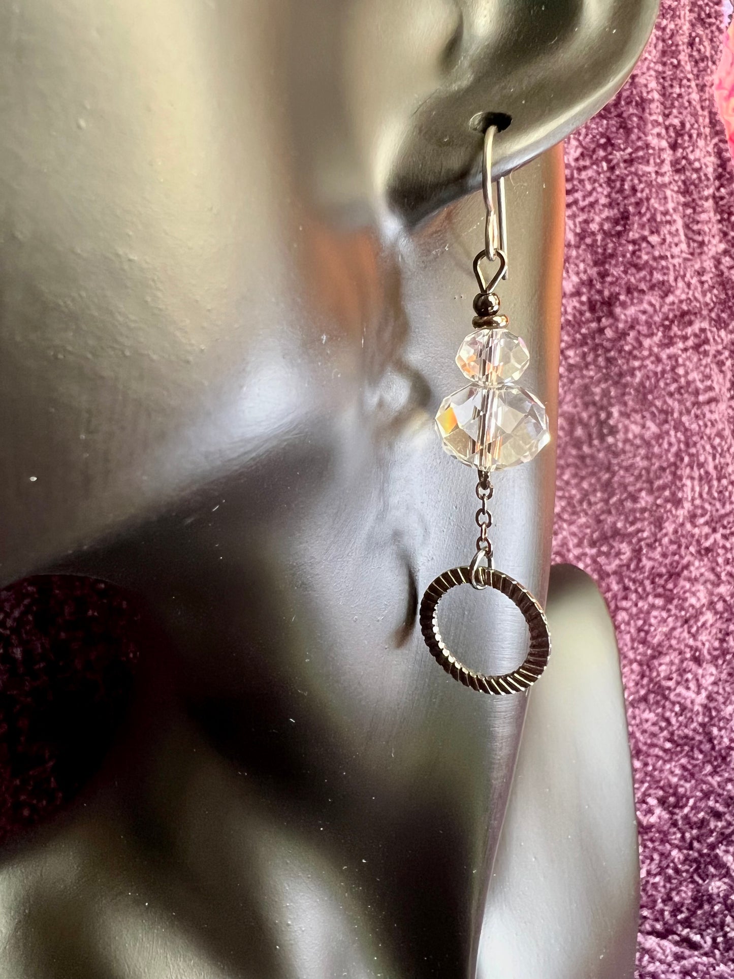 Earrings- Titanium ear hooks, gunmetal plated metal and clear crystals.