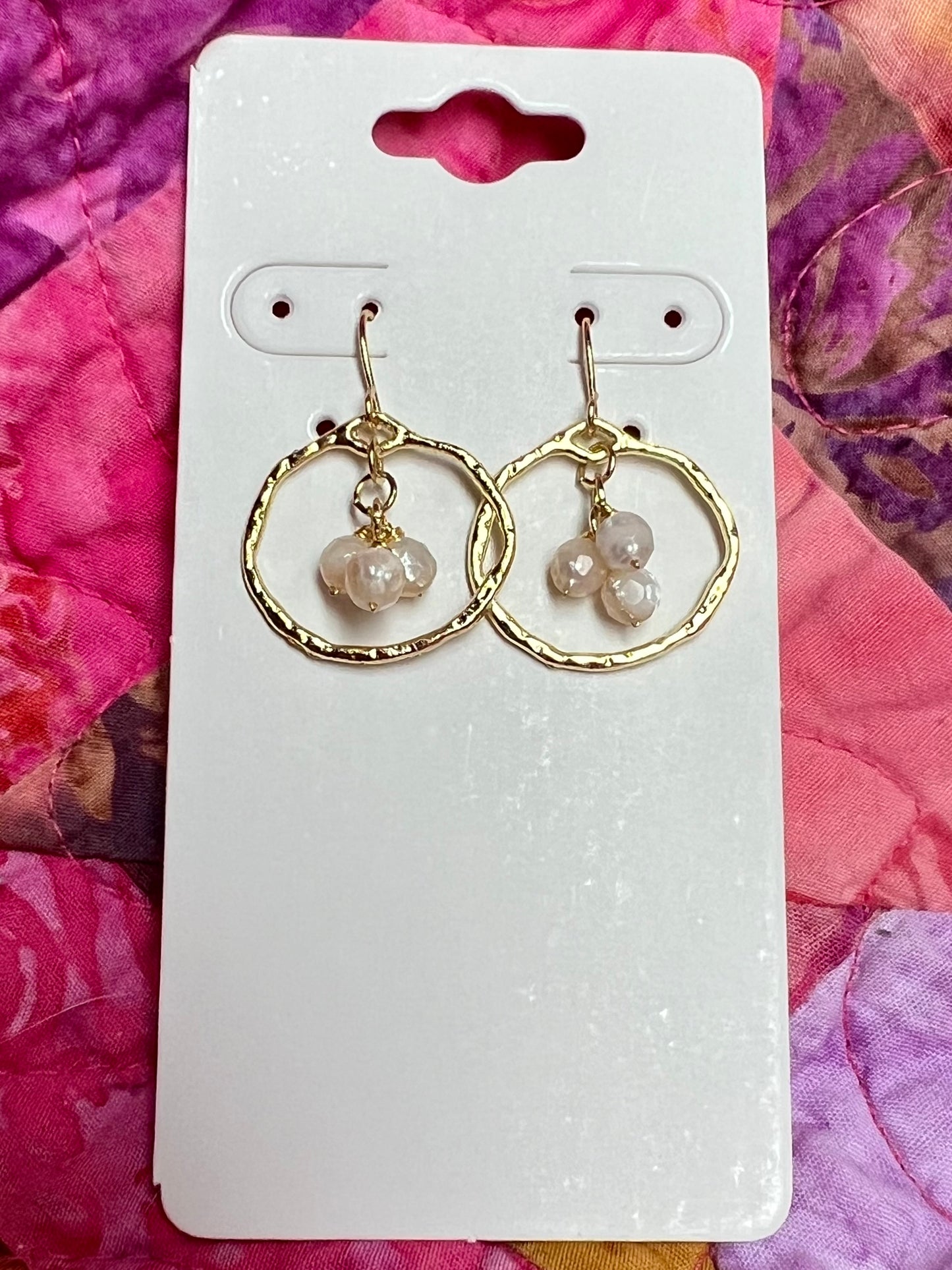 Earrings- Light gold plated metal with wire wrapped white faceted genuine freshwater pearls.