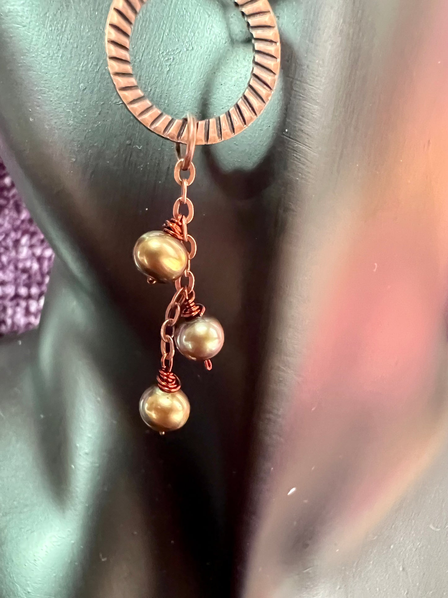 Earrings- Antique copper metal with wire wrapped green/gold iridescent freshwater pearls.