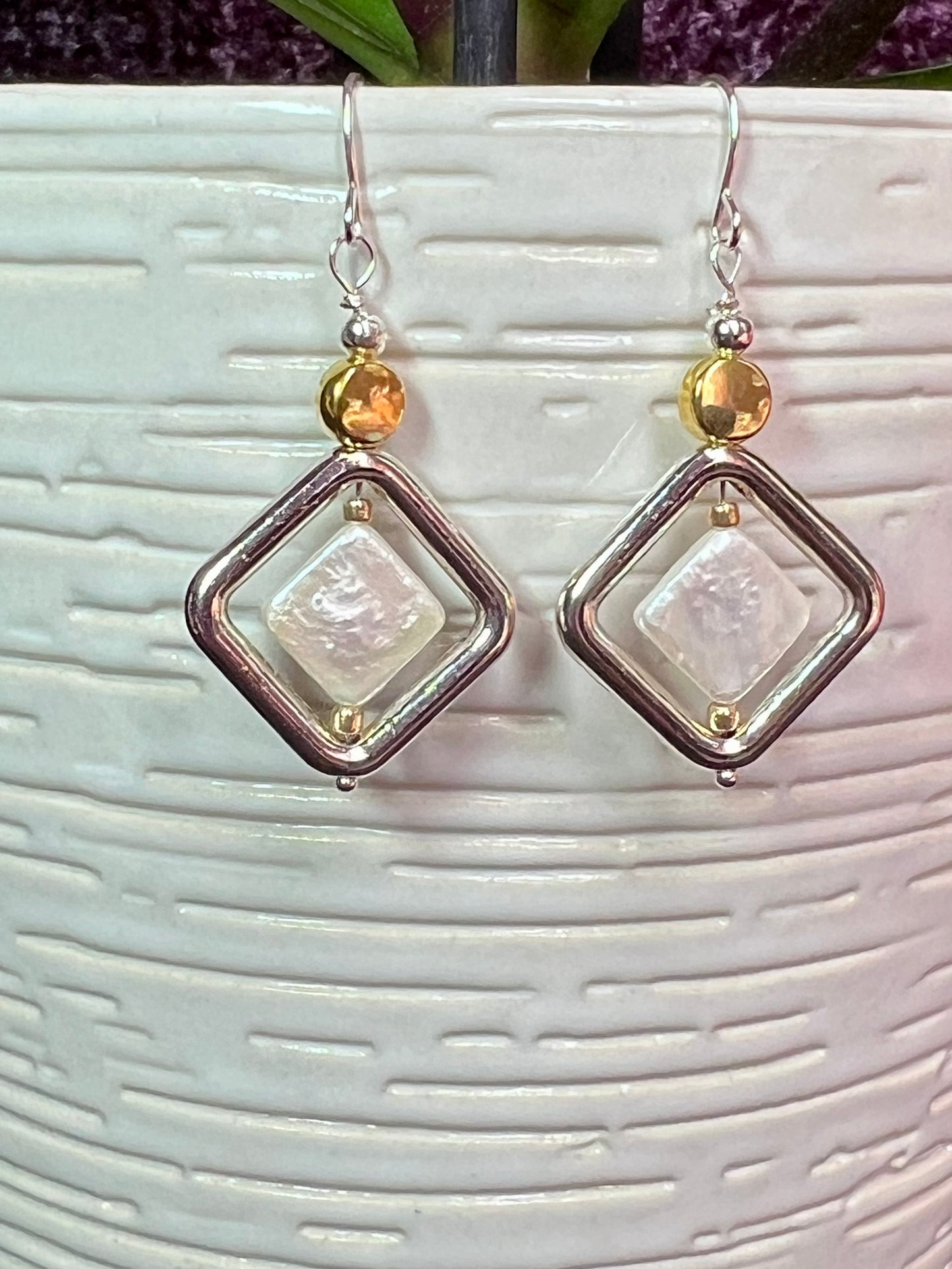 Earrings- Gold and silver and antiqued silver plated metal white iridescent diamond shaped freshwater pearls.