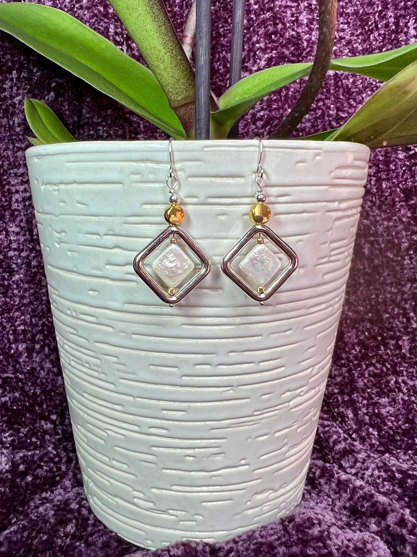 Earrings- Gold and silver and antiqued silver plated metal white iridescent diamond shaped freshwater pearls.