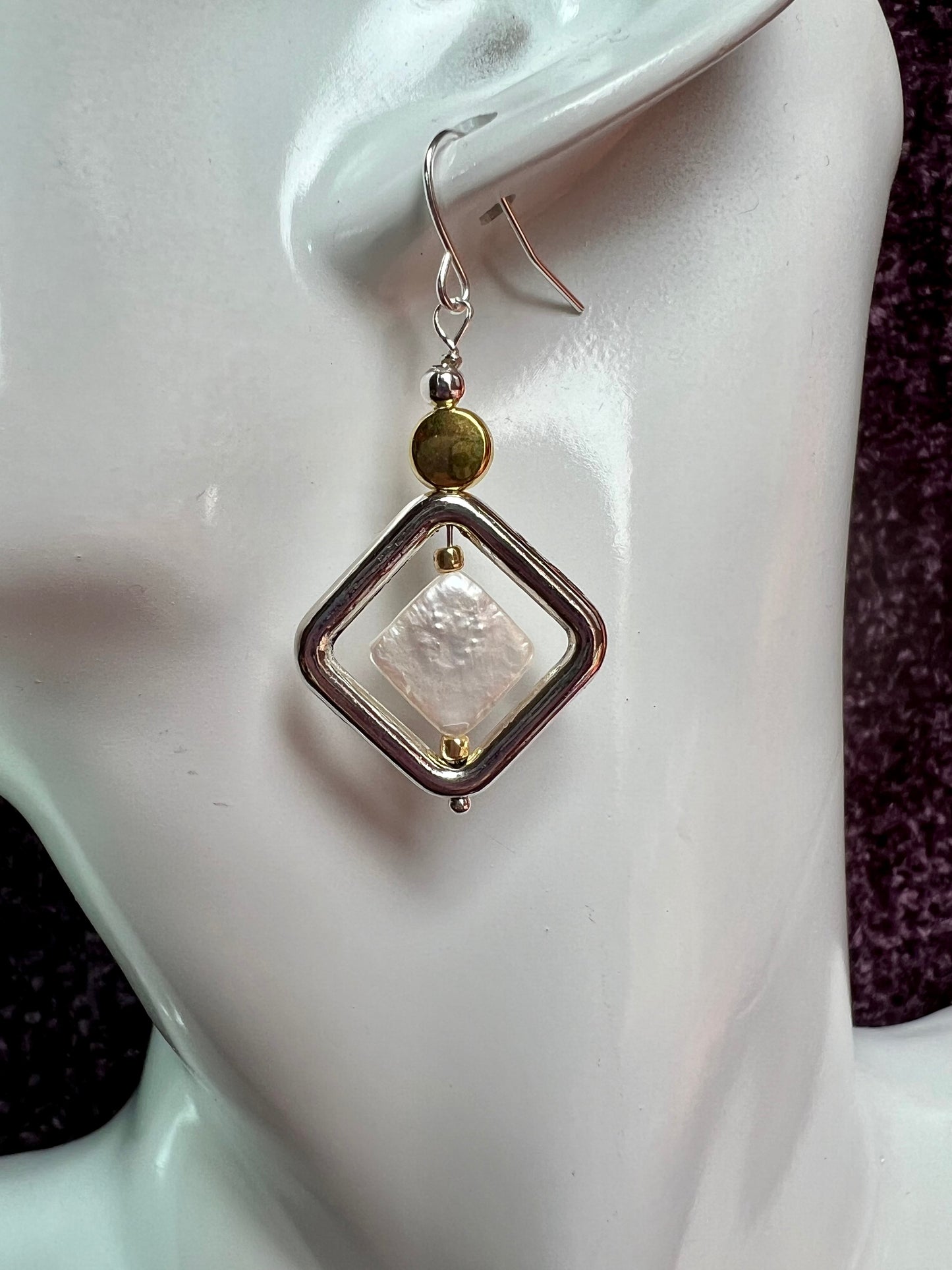 Earrings- Gold and silver and antiqued silver plated metal white iridescent diamond shaped freshwater pearls.