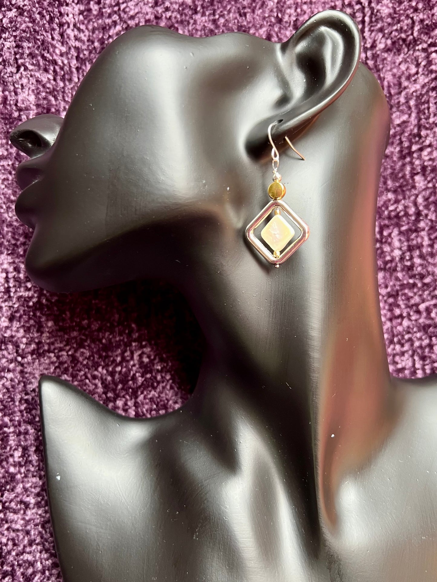 Earrings- Gold and silver and antiqued silver plated metal white iridescent diamond shaped freshwater pearls.