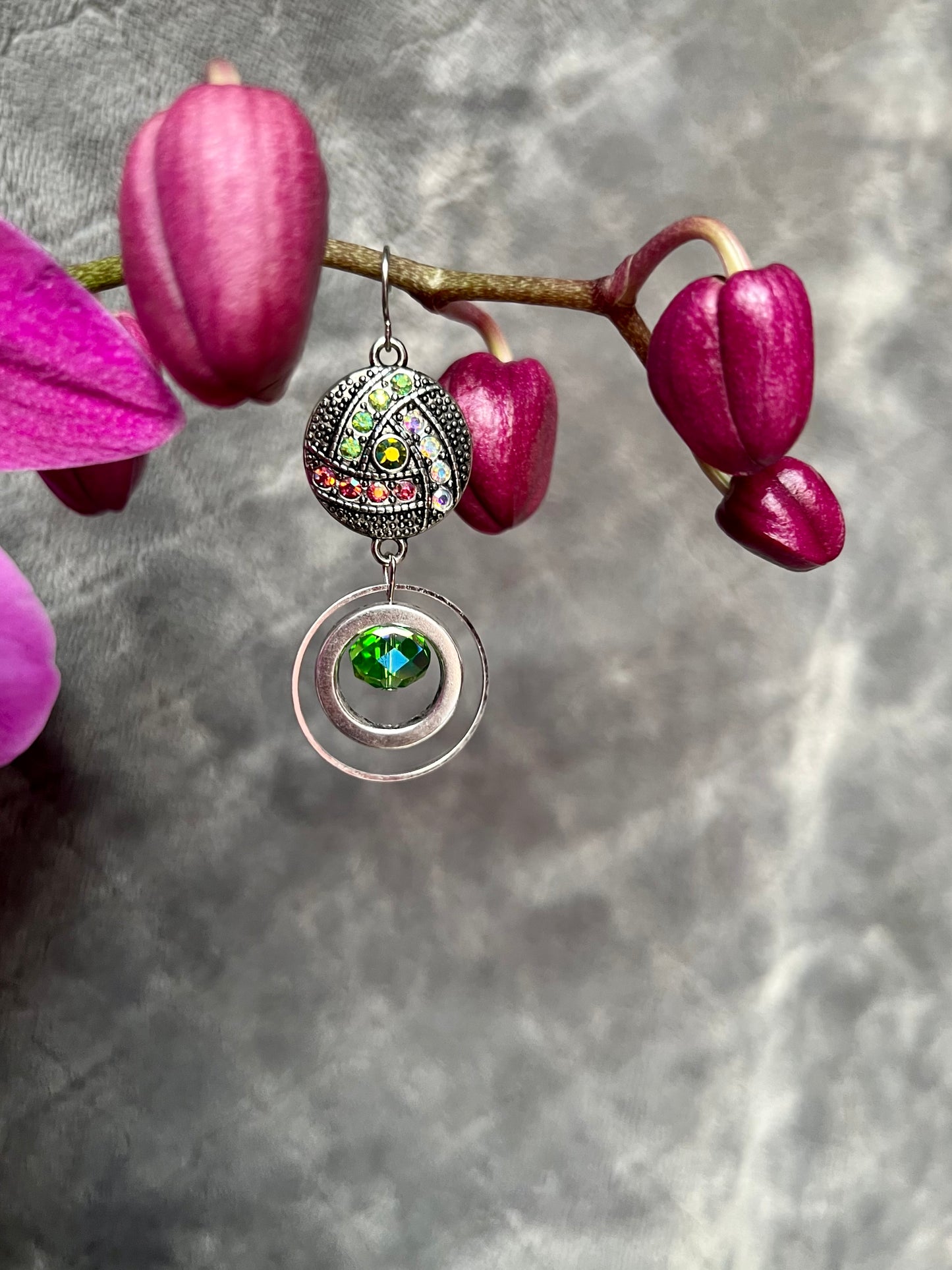 Earrings- Antiqued silver plated metal with green and coral AB crystal rhinestones.