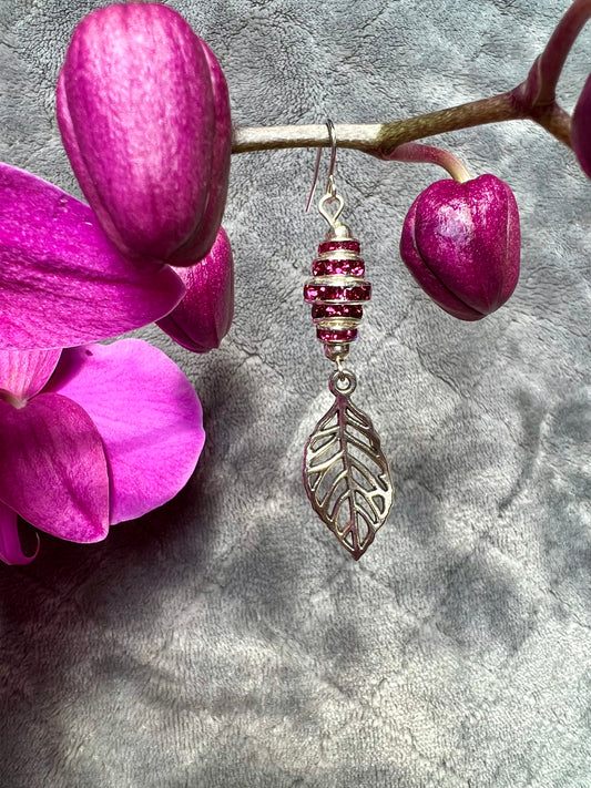 Earrings- Silver plated metal leaves with fuchsia colored crystal rondelles.