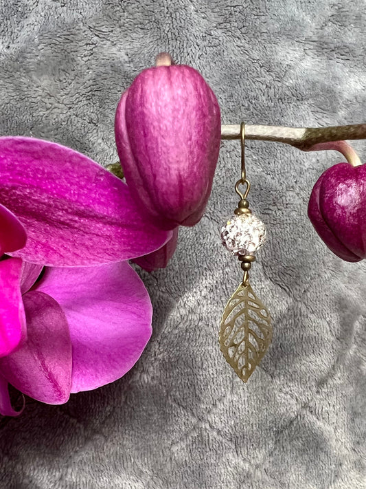 Earrings- Antique gold plated metal leaves with polymer clay beads with clear crystal rhinestones.