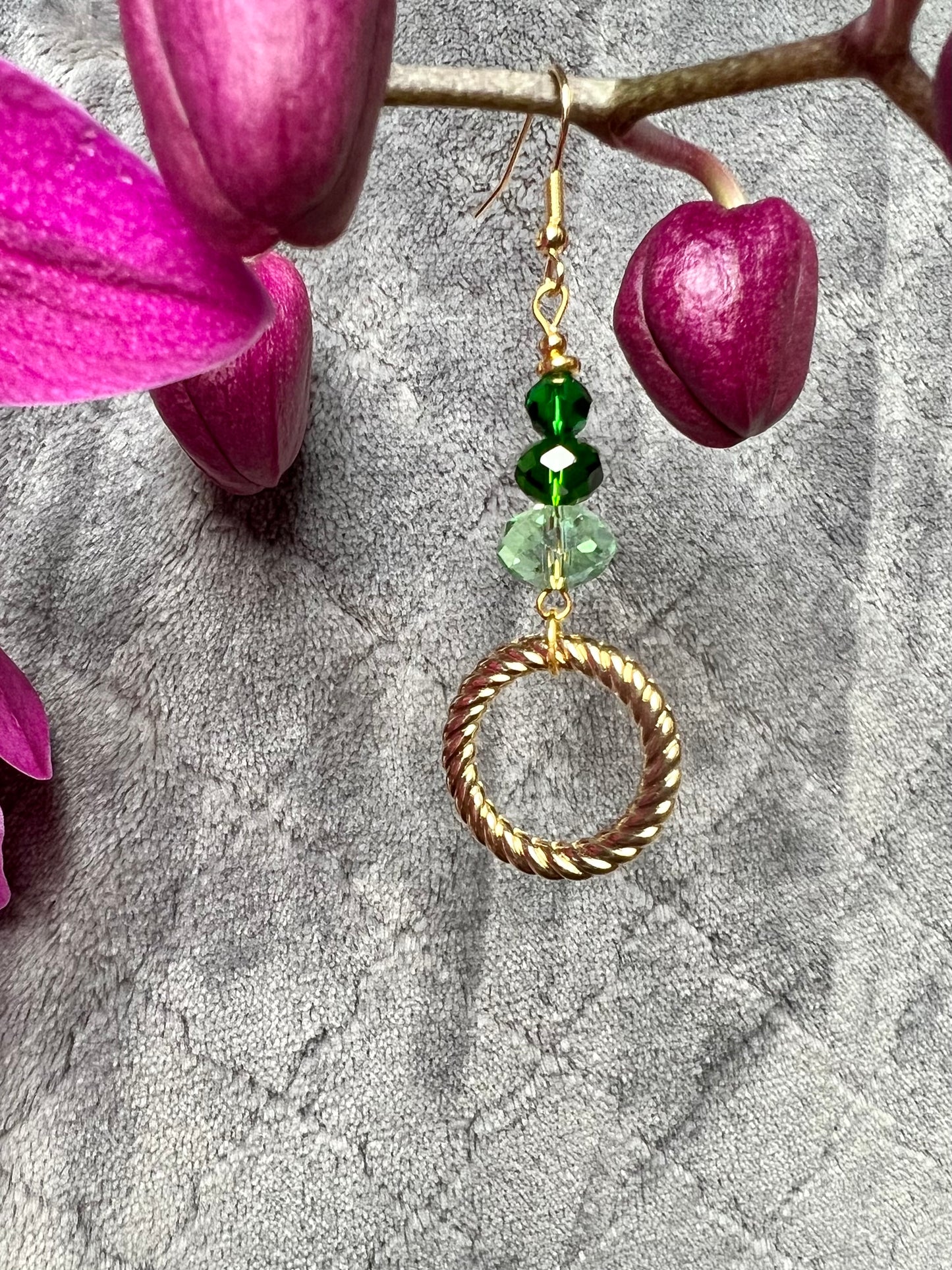 Earrings- Gold plated stainless steel ear hooks, gold plated metal with various green colored crystals.