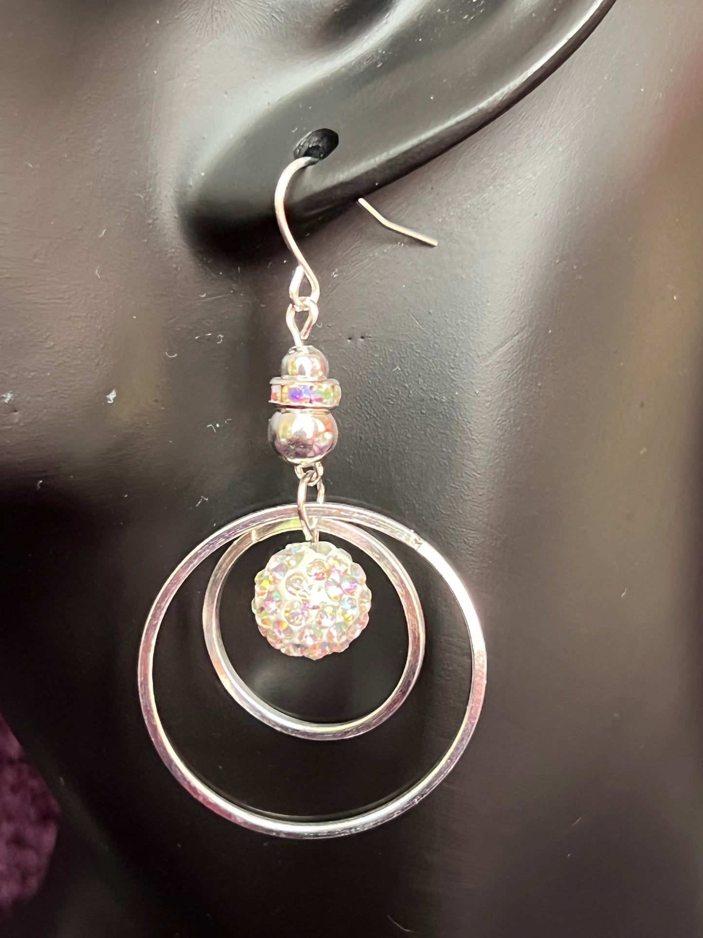 Earrings- Silver plated metal with AB crystal rondelle & clay bead with AB rhinestones.