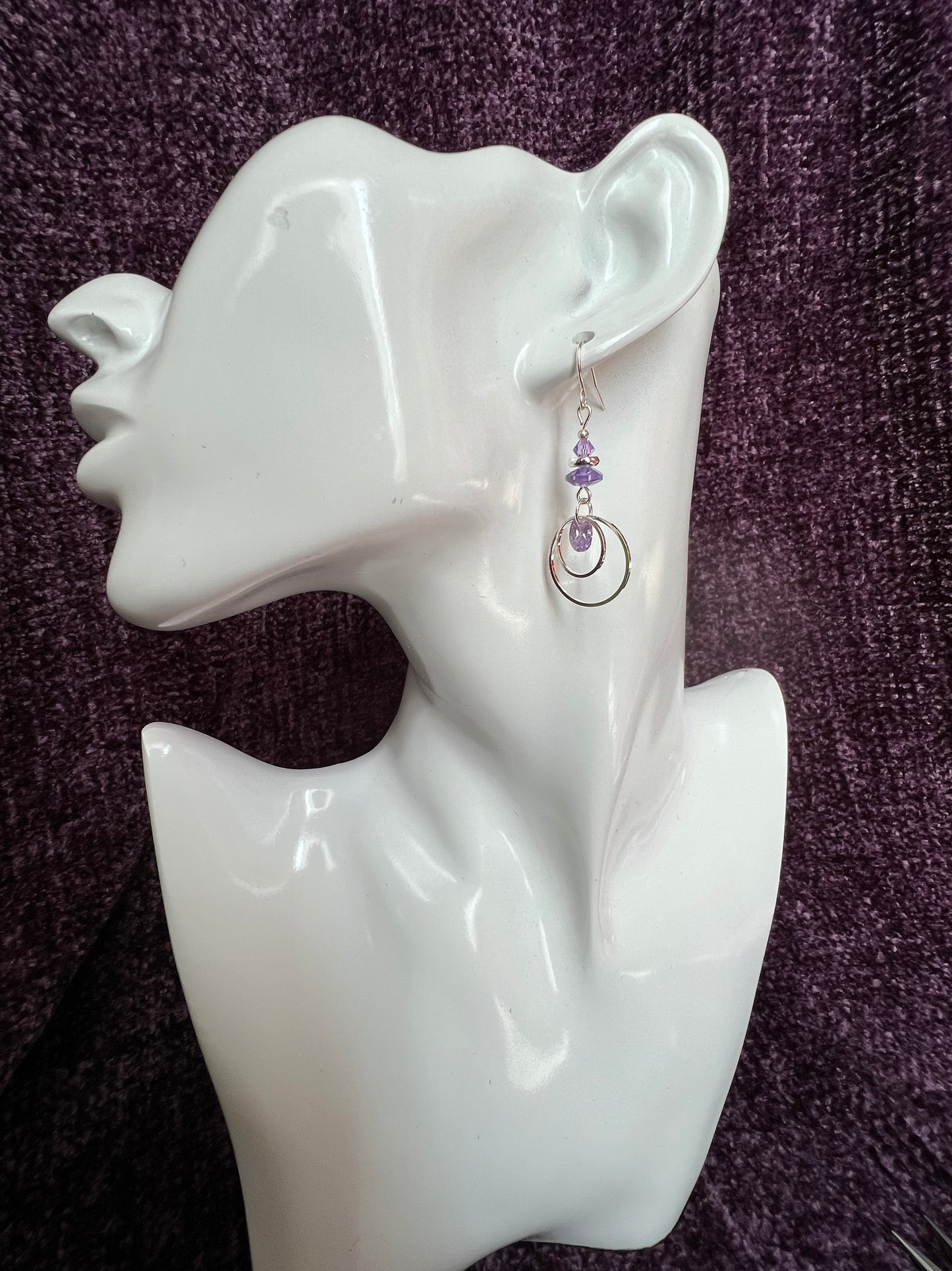 Earrings- Silver plated metal with Swarovski bicone crystals and cubic zirconia beads. Multiple colors available.