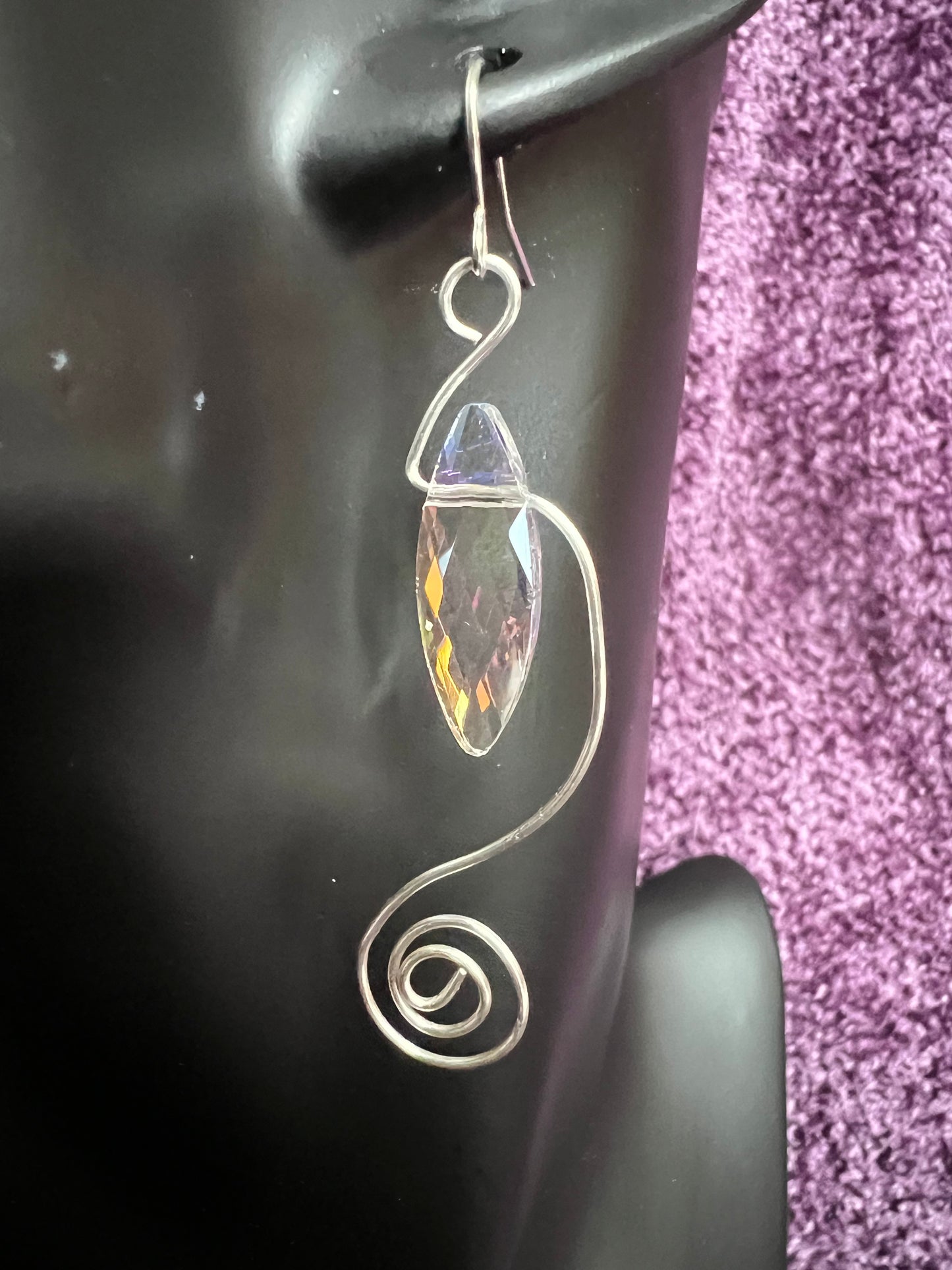 Earrings- Spiral shaped wire with marquise shaped crystal.