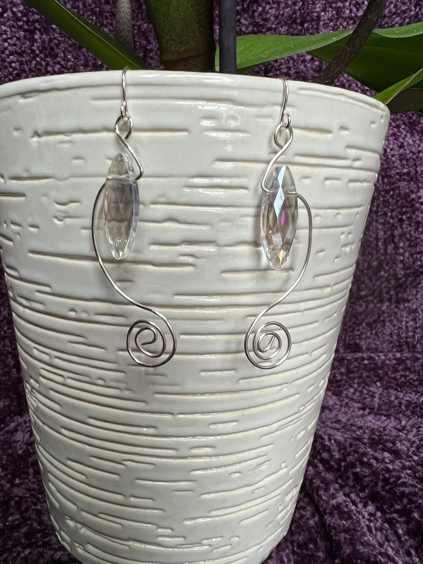 Earrings- Spiral shaped wire with marquise shaped crystal.