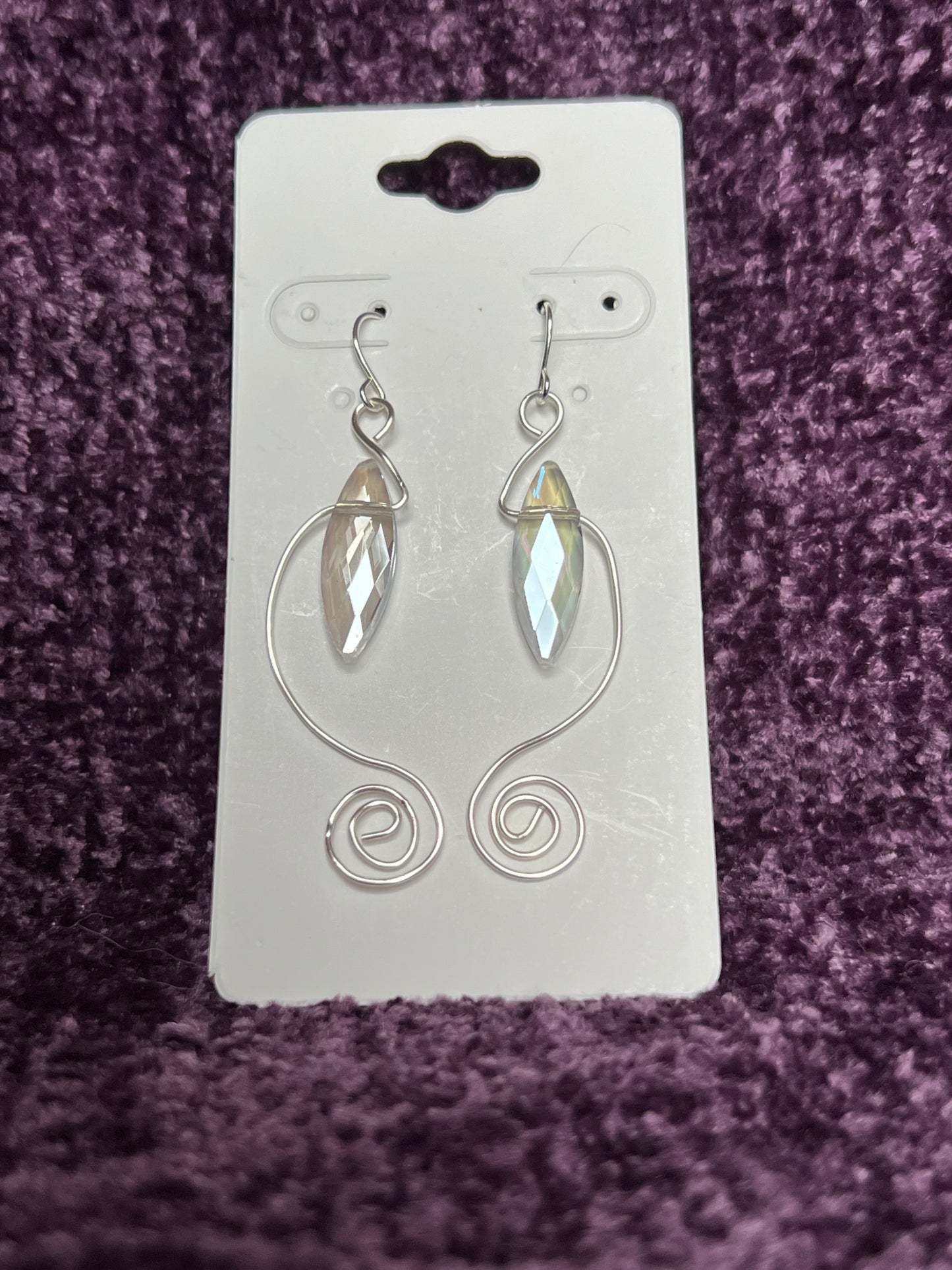 Earrings- Spiral shaped wire with marquise shaped crystal.