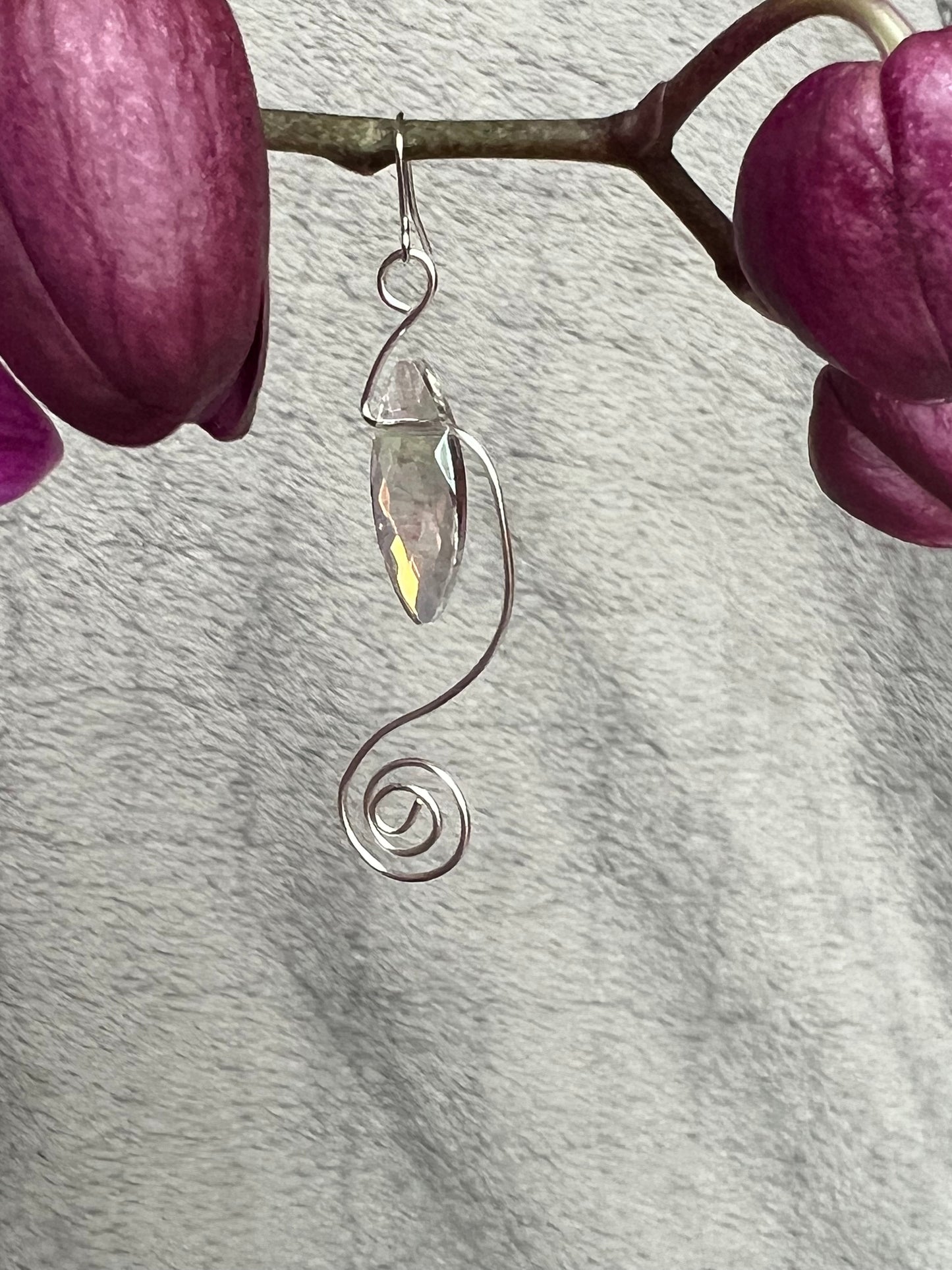 Earrings- Spiral shaped wire with marquise shaped crystal.