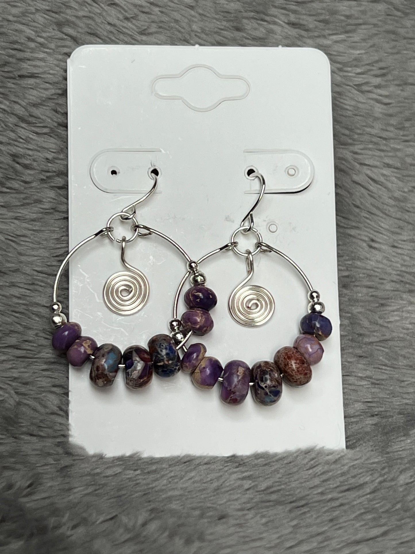 Earrings- Silver plated metal and purple stone beads.