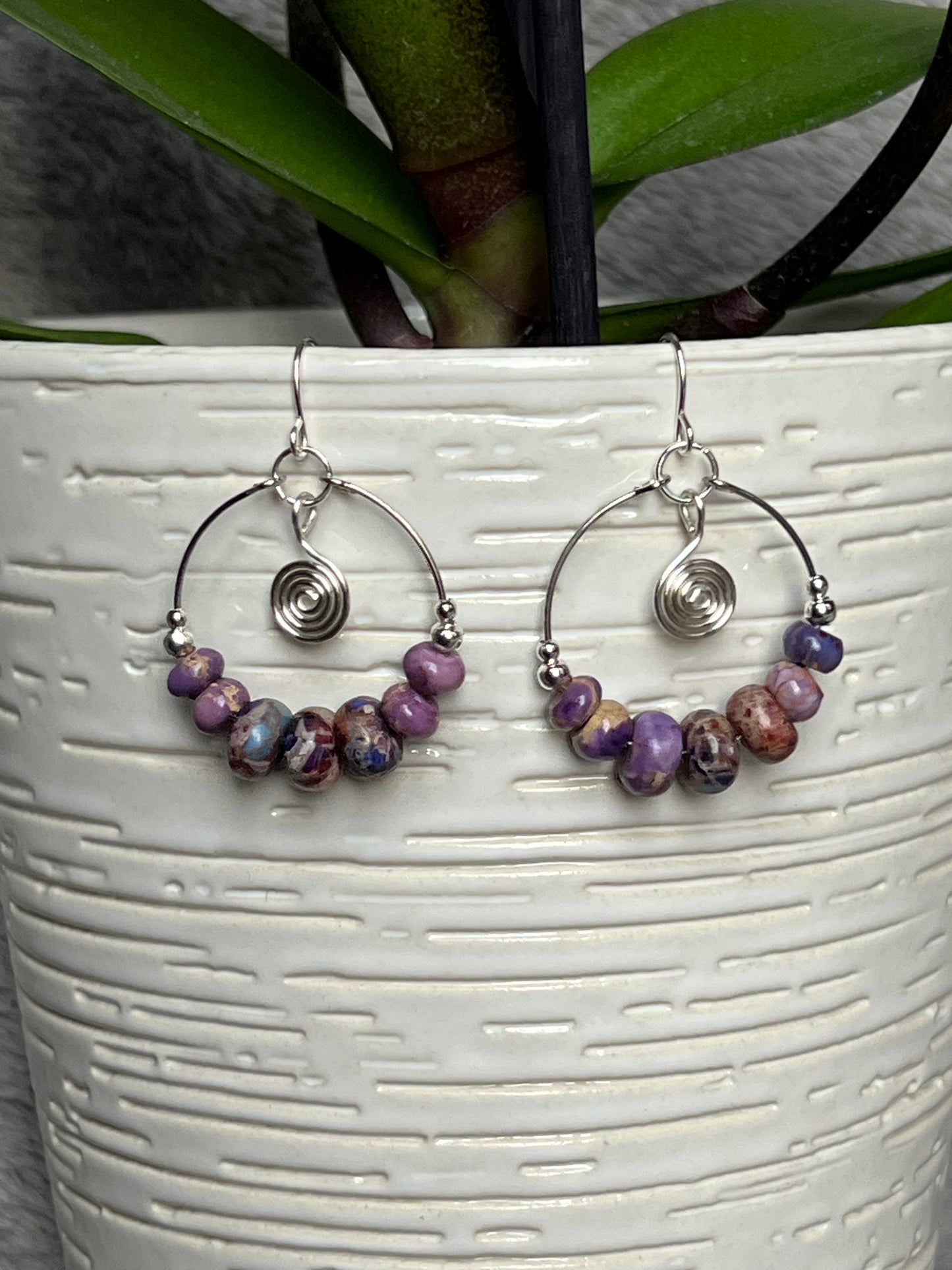 Earrings- Silver plated metal and purple stone beads.