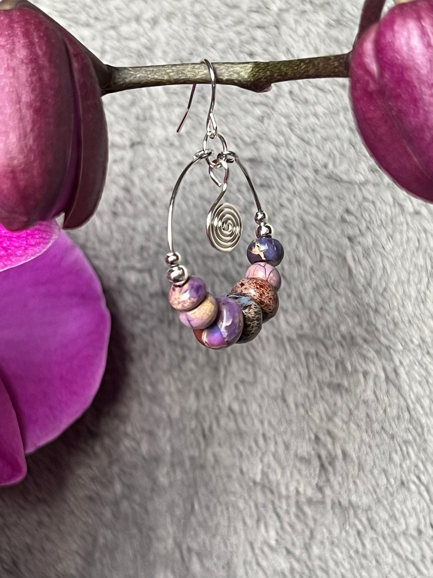 Earrings- Silver plated metal and purple stone beads.