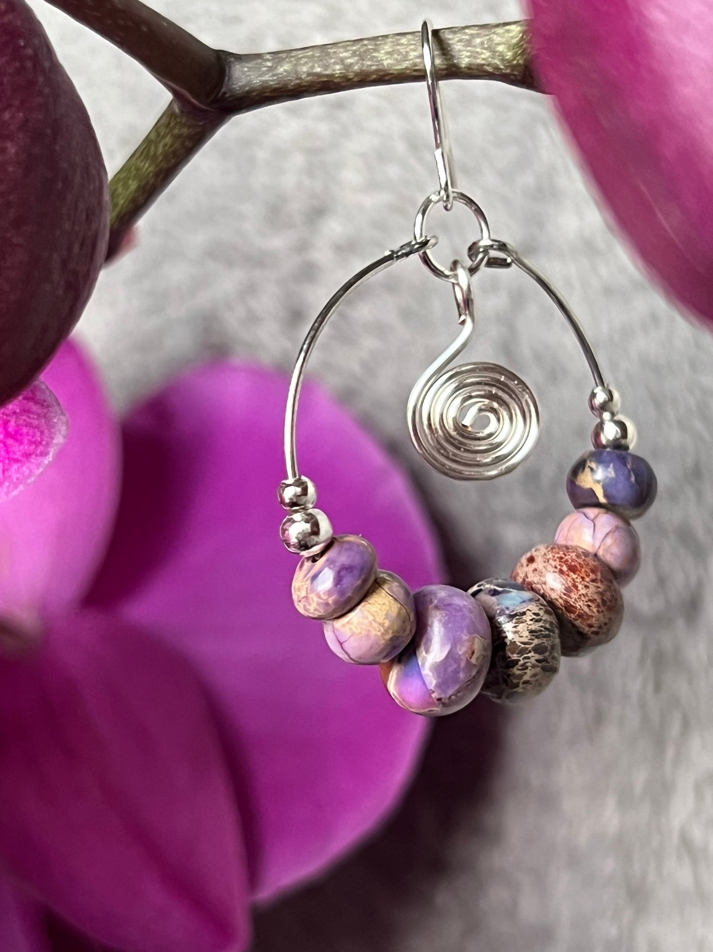 Earrings- Silver plated metal and purple stone beads.