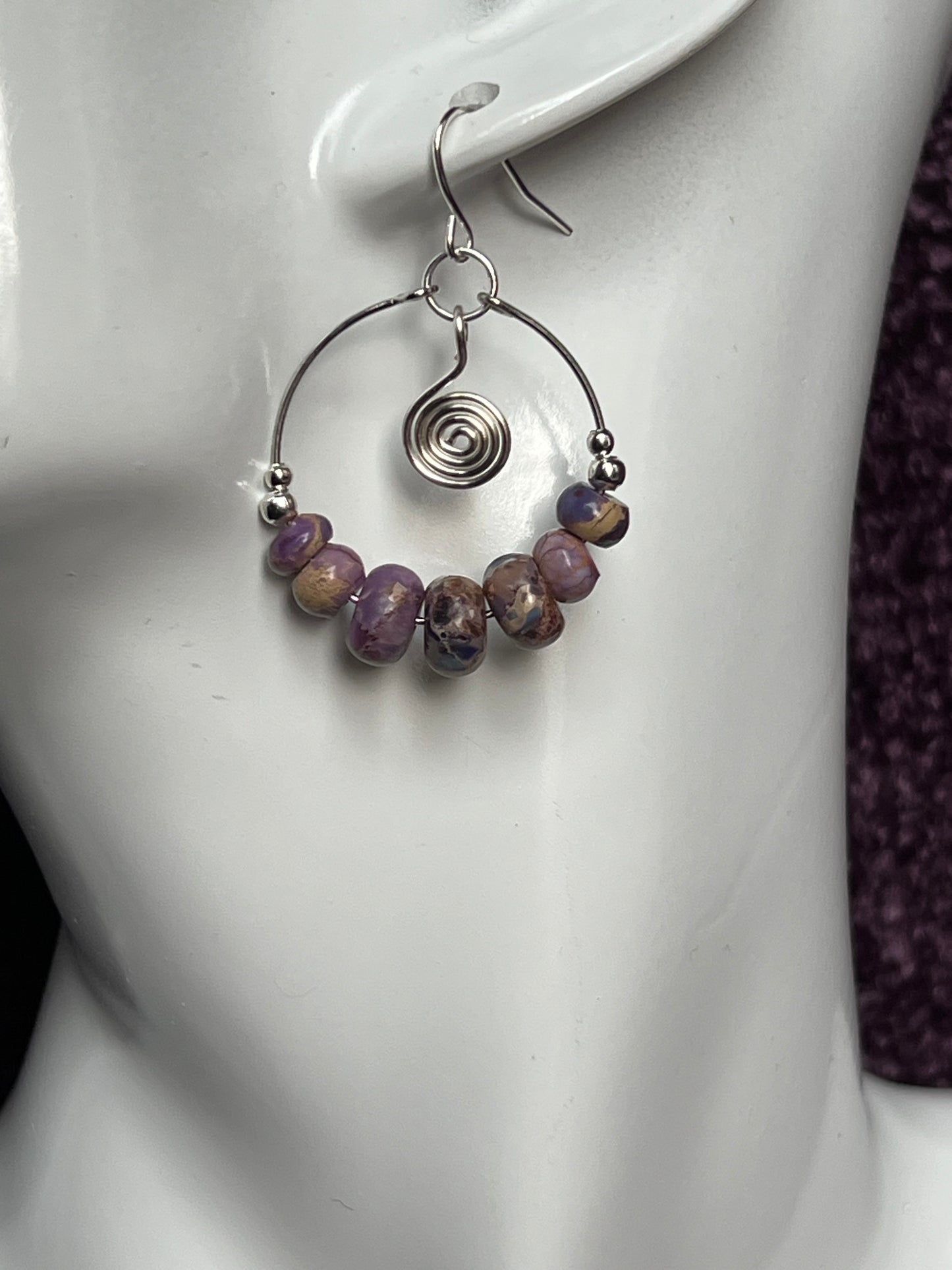 Earrings- Silver plated metal and purple stone beads.