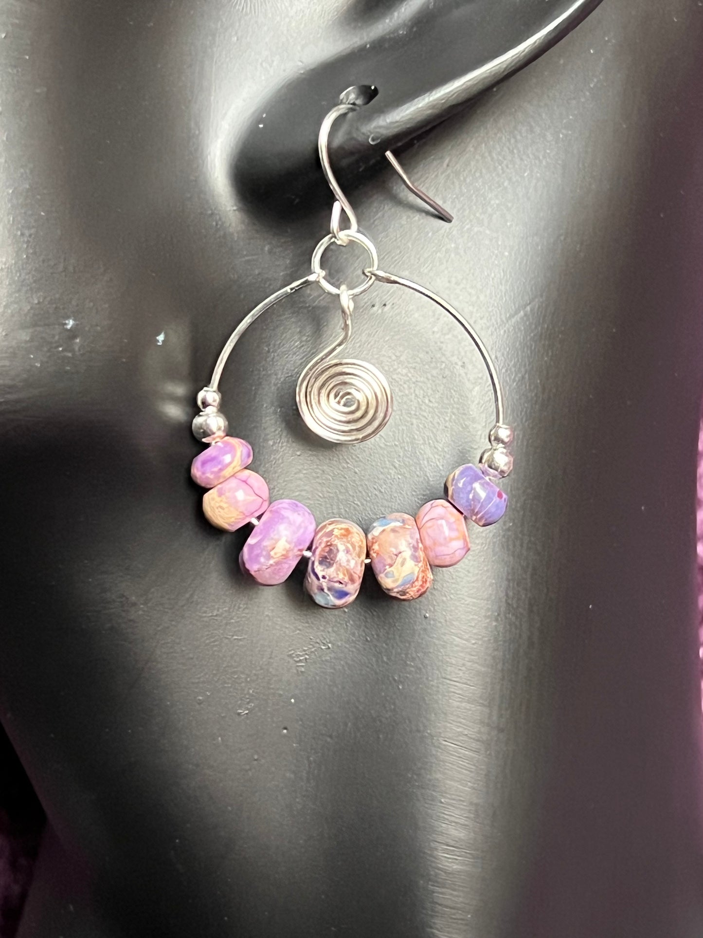 Earrings- Silver plated metal and purple stone beads.