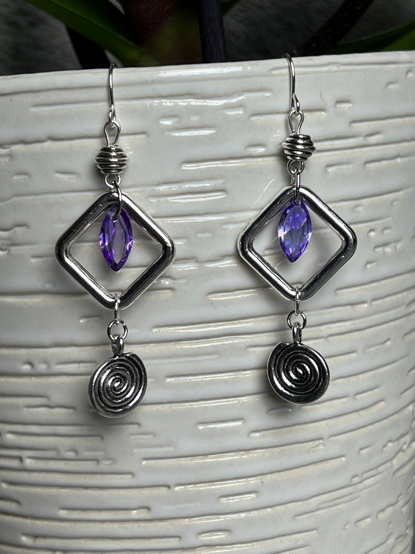 Earrings- Antiqued silver plated metal beads with purple cubic zirconia beads and swirl bead.