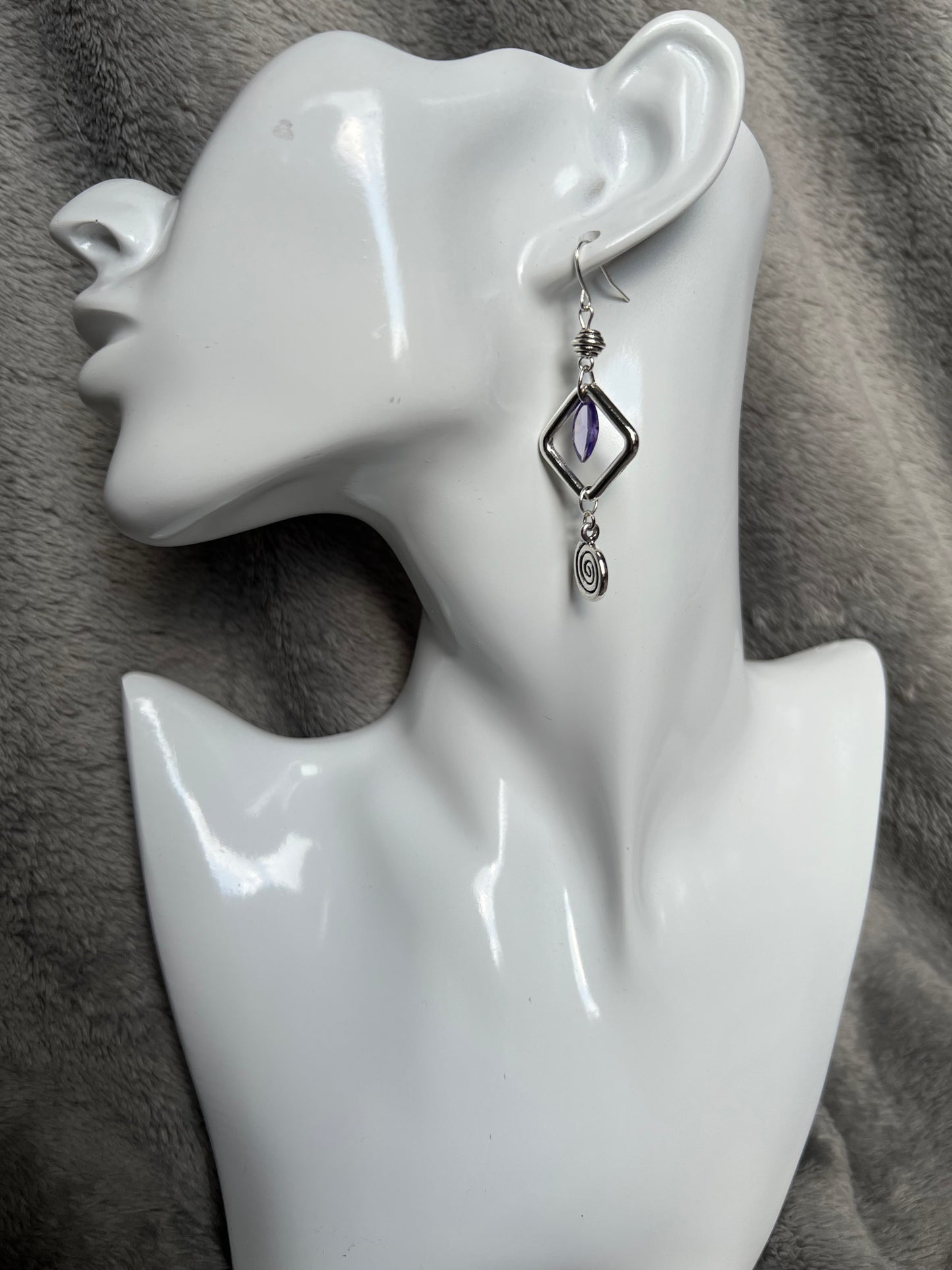 Earrings- Antiqued silver plated metal beads with purple cubic zirconia beads and swirl bead.