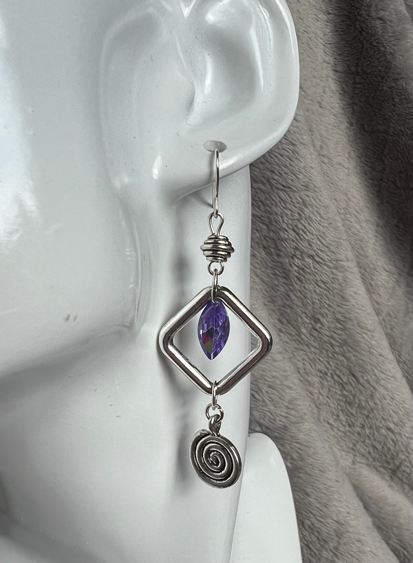 Earrings- Antiqued silver plated metal beads with purple cubic zirconia beads and swirl bead.