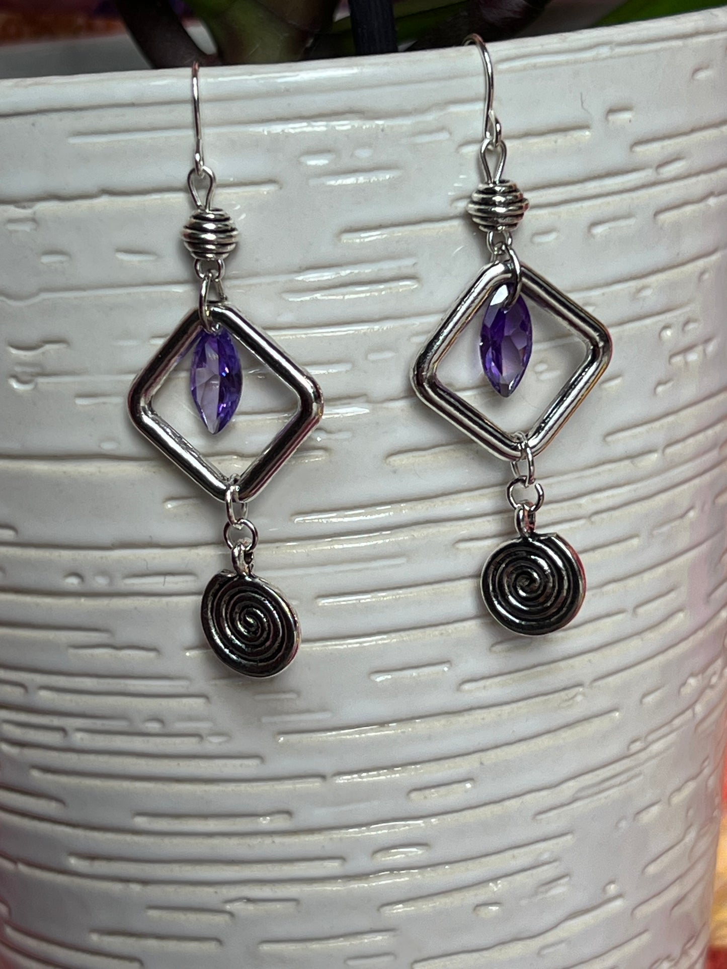 Earrings- Antiqued silver plated metal beads with purple cubic zirconia beads and swirl bead.