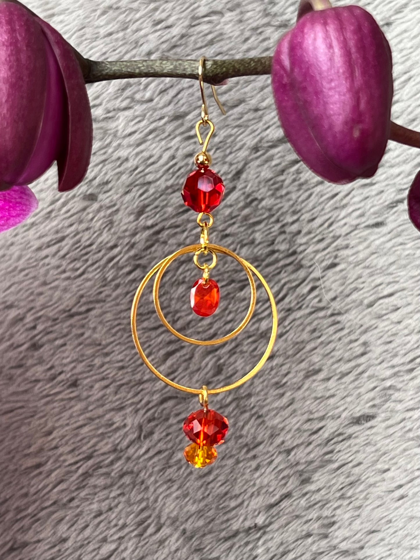 Earrings- Gold plated metal with orange & red crystal & cubic zirconia beads.