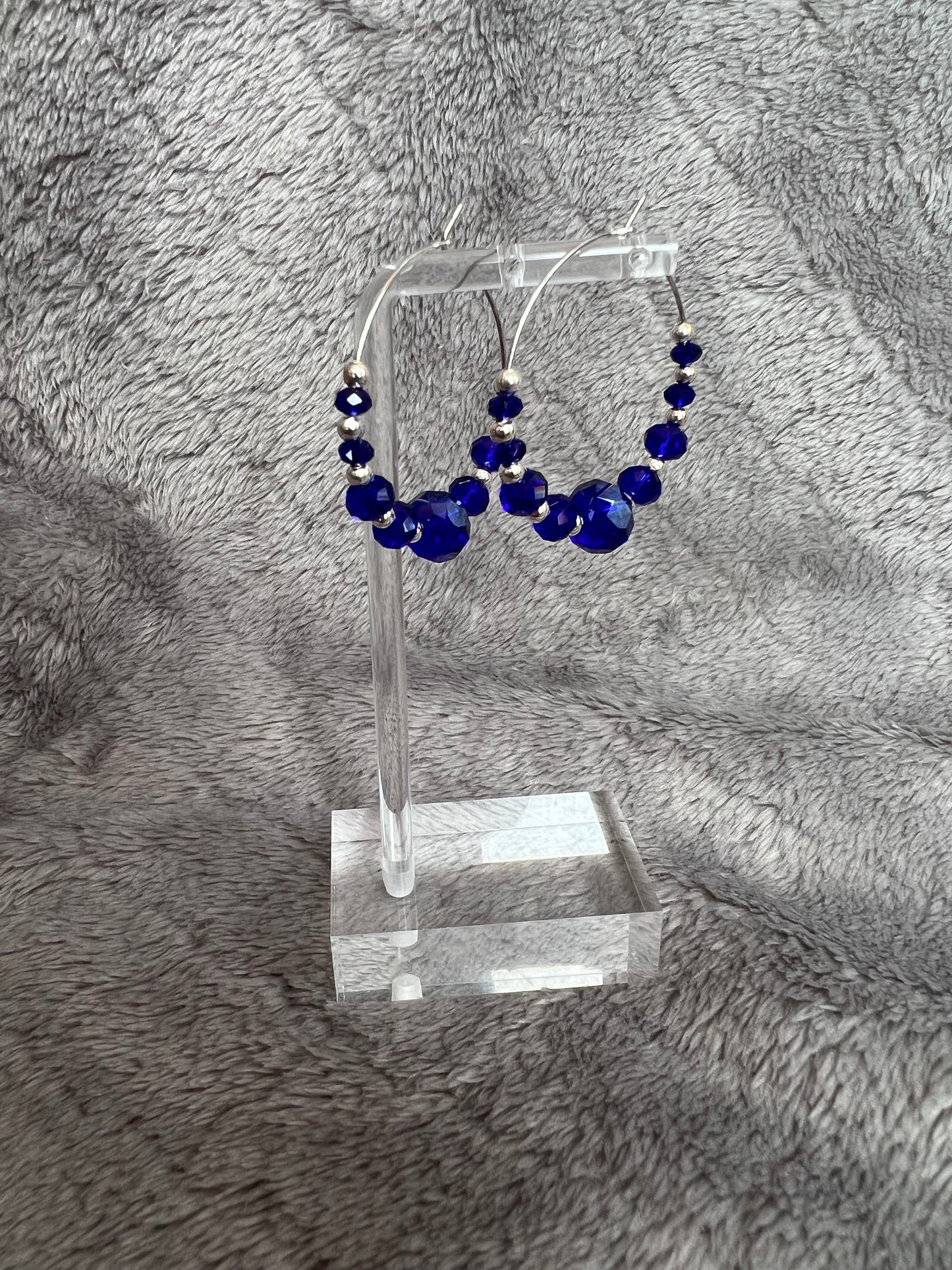 Earrings- Silver plated metal with cobalt blue crystal beads.