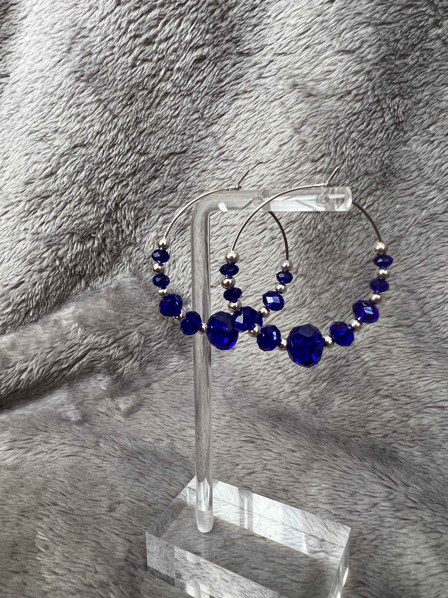 Earrings- Silver plated metal with cobalt blue crystal beads.