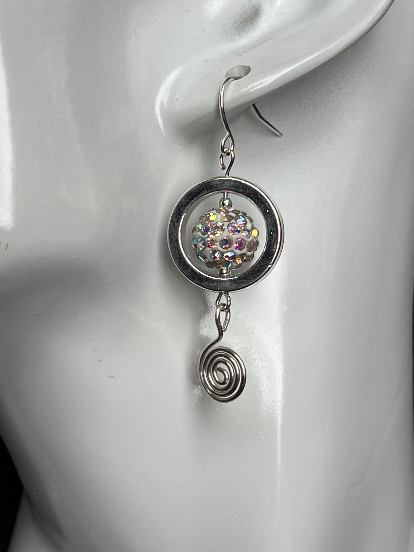 Earrings- Silver plated metal with AB crystals and swirl bead.