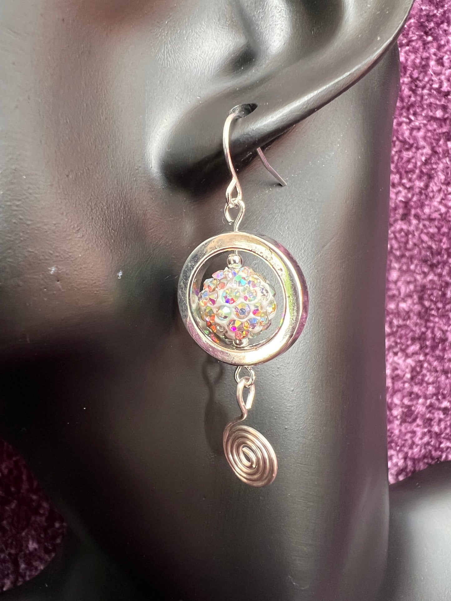 Earrings- Silver plated metal with AB crystals and swirl bead.