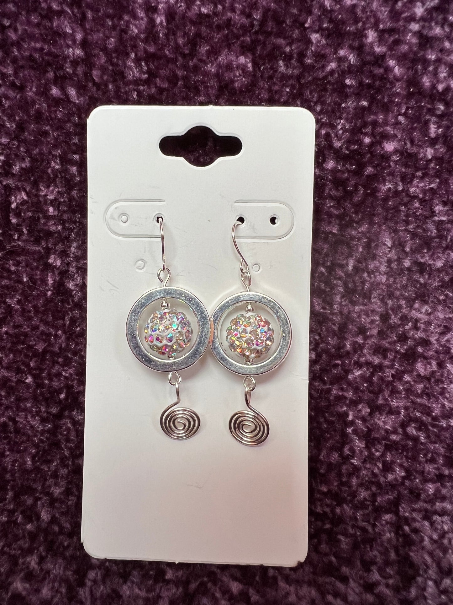 Earrings- Silver plated metal with AB crystals and swirl bead.