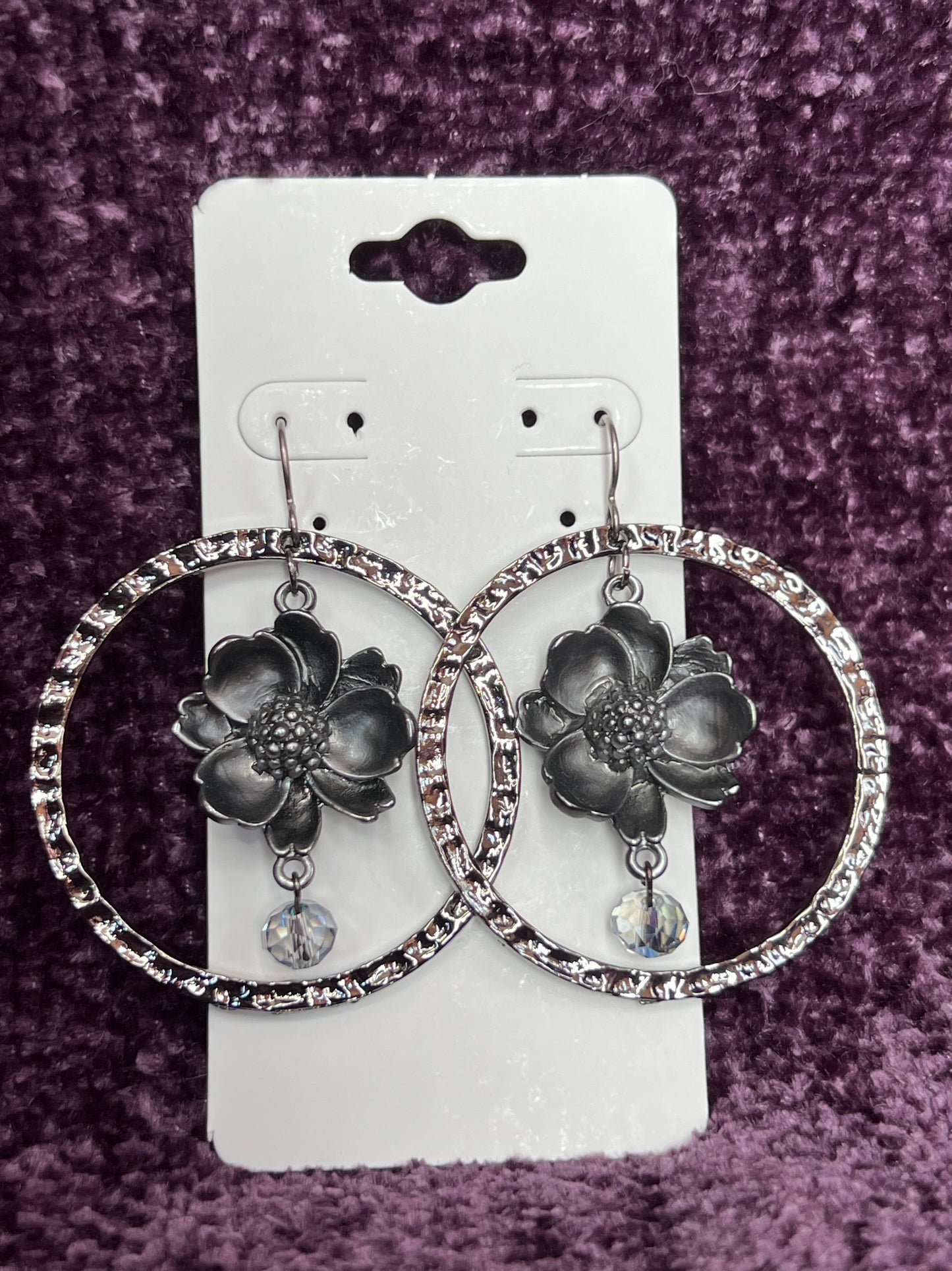 Earrings- Flower shaped plated gun metal with stainless steel ear wires.