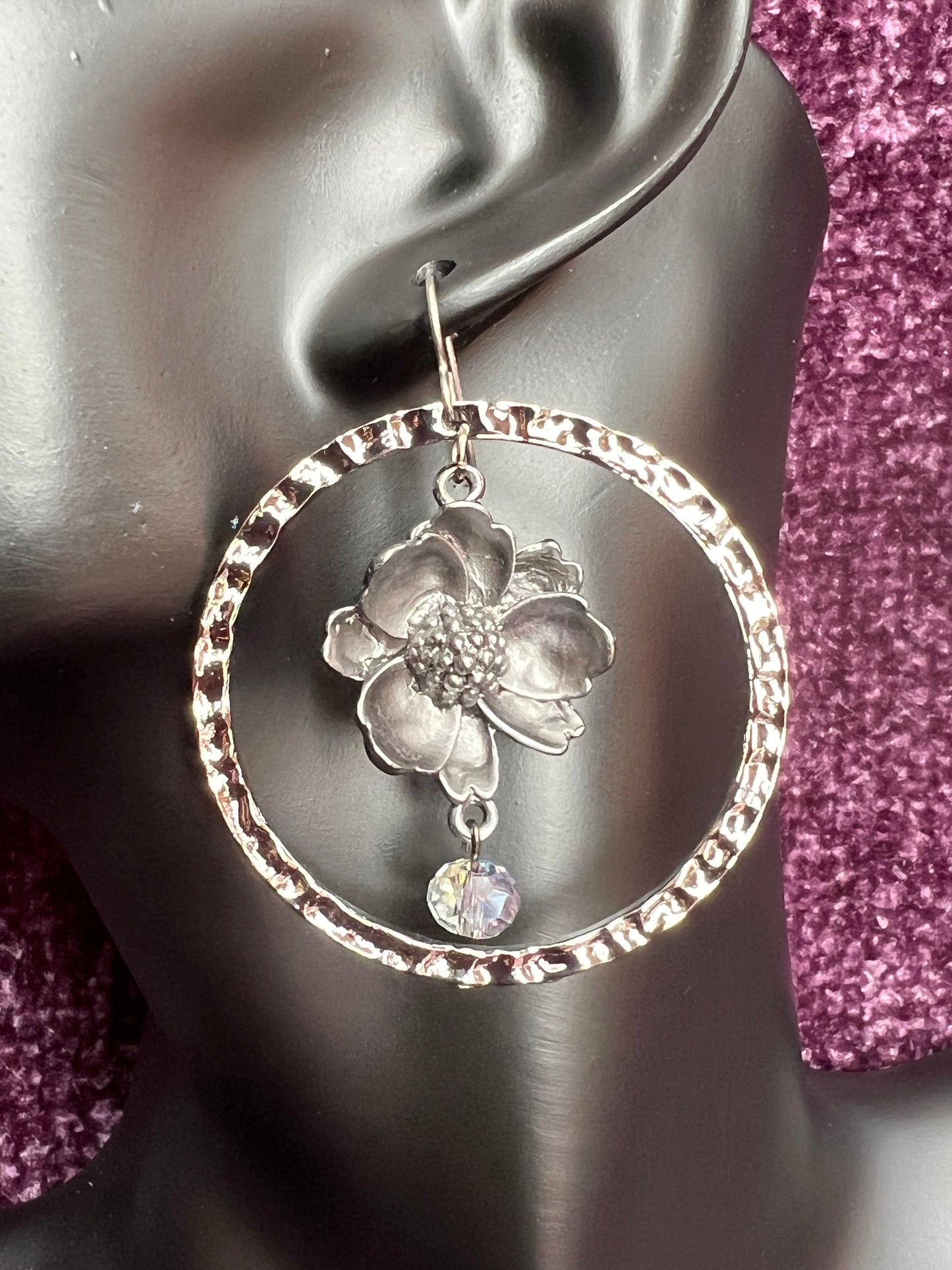 Earrings- Flower shaped plated gun metal with stainless steel ear wires.