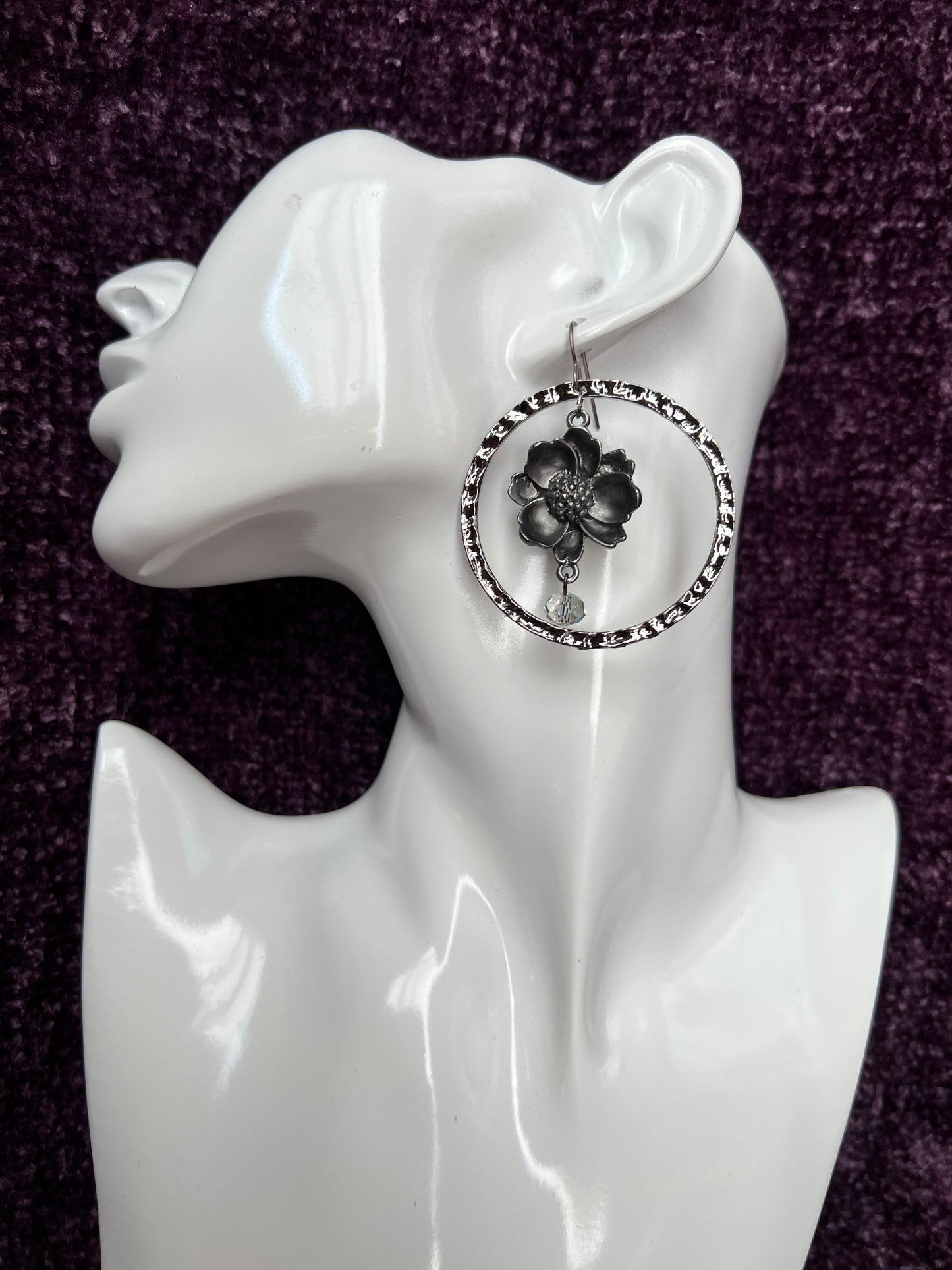 Earrings- Flower shaped plated gun metal with stainless steel ear wires.