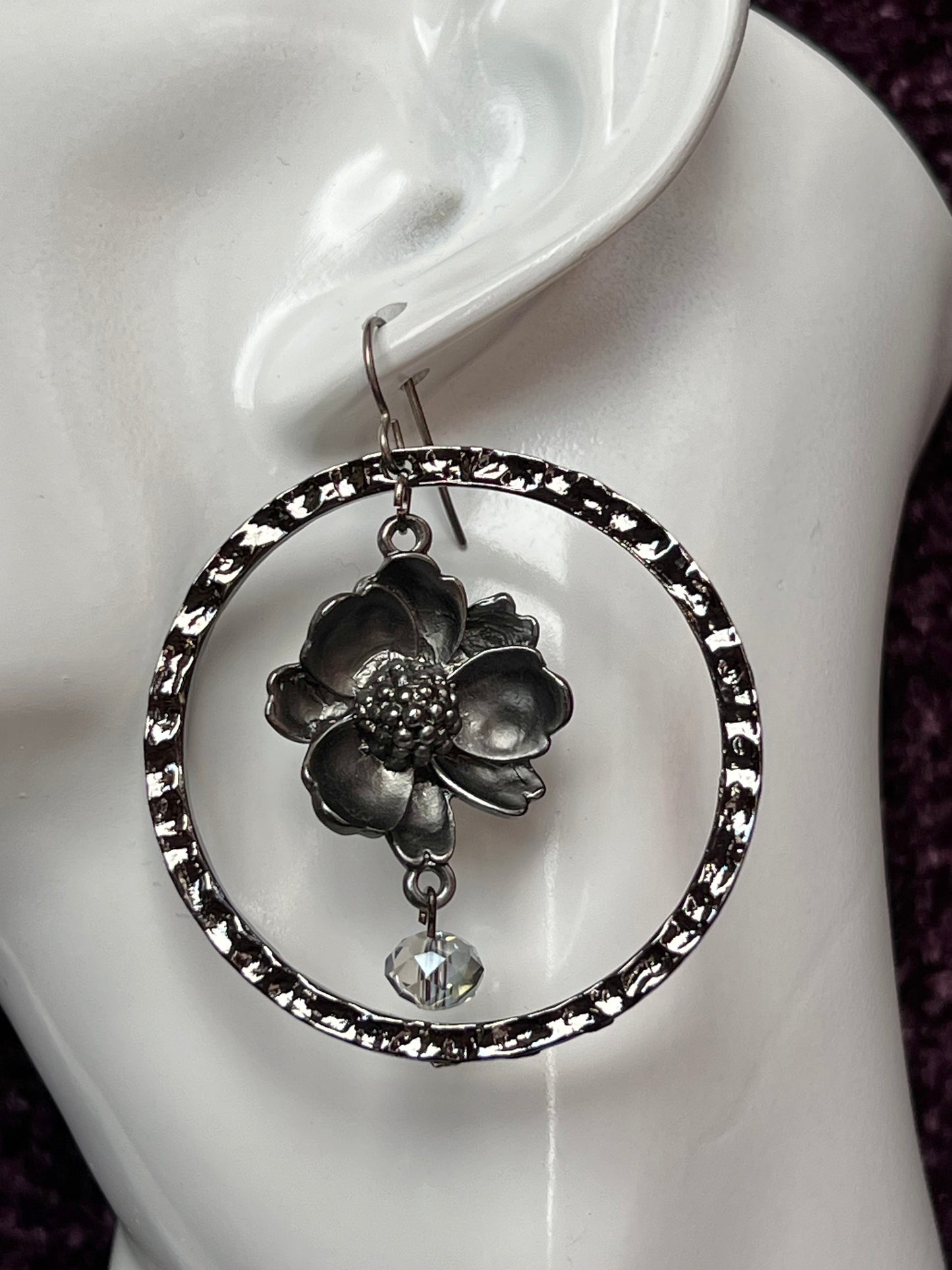 Earrings- Flower shaped plated gun metal with stainless steel ear wires.