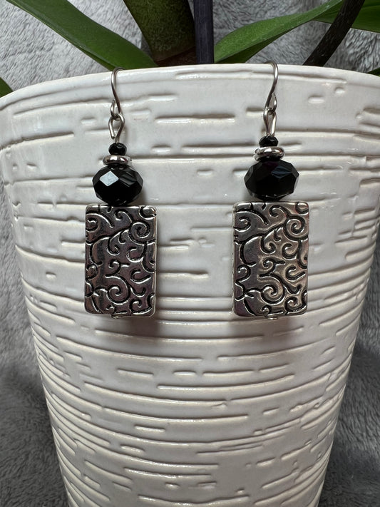 Earrings- Silver plated metal with black crystals beads.