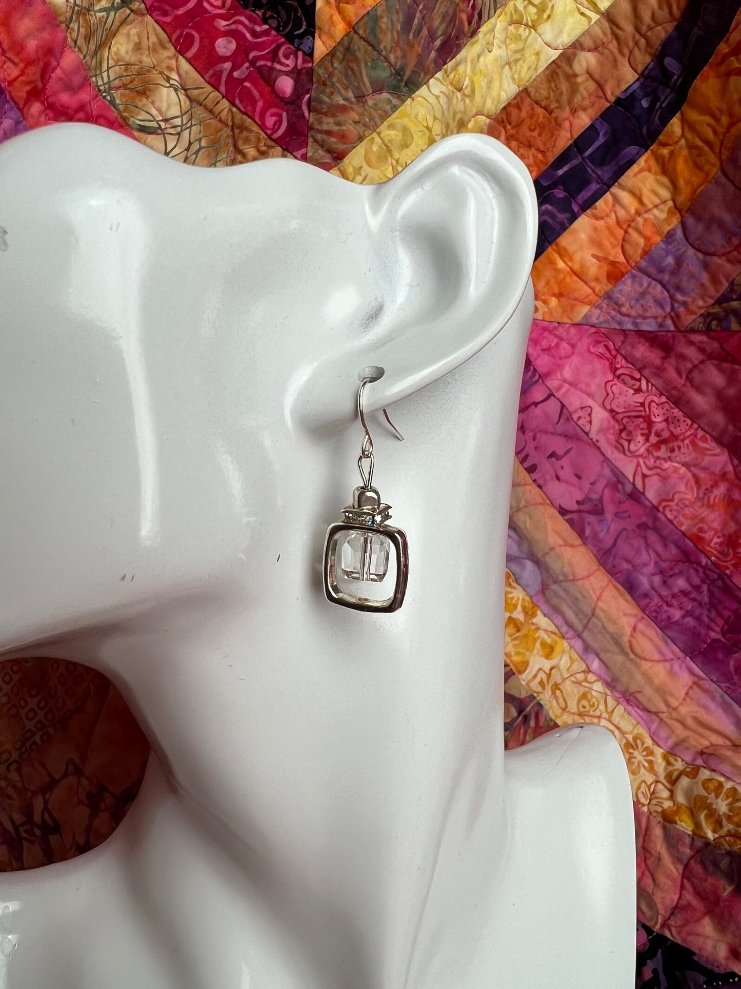 Earrings- Silver plated metal with clear crystal square rondelle and square crystal bead in center.