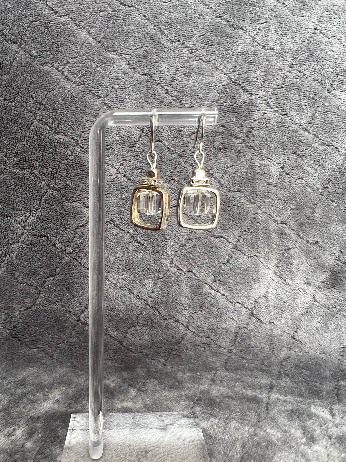 Earrings- Silver plated metal with clear crystal square rondelle and square crystal bead in center.